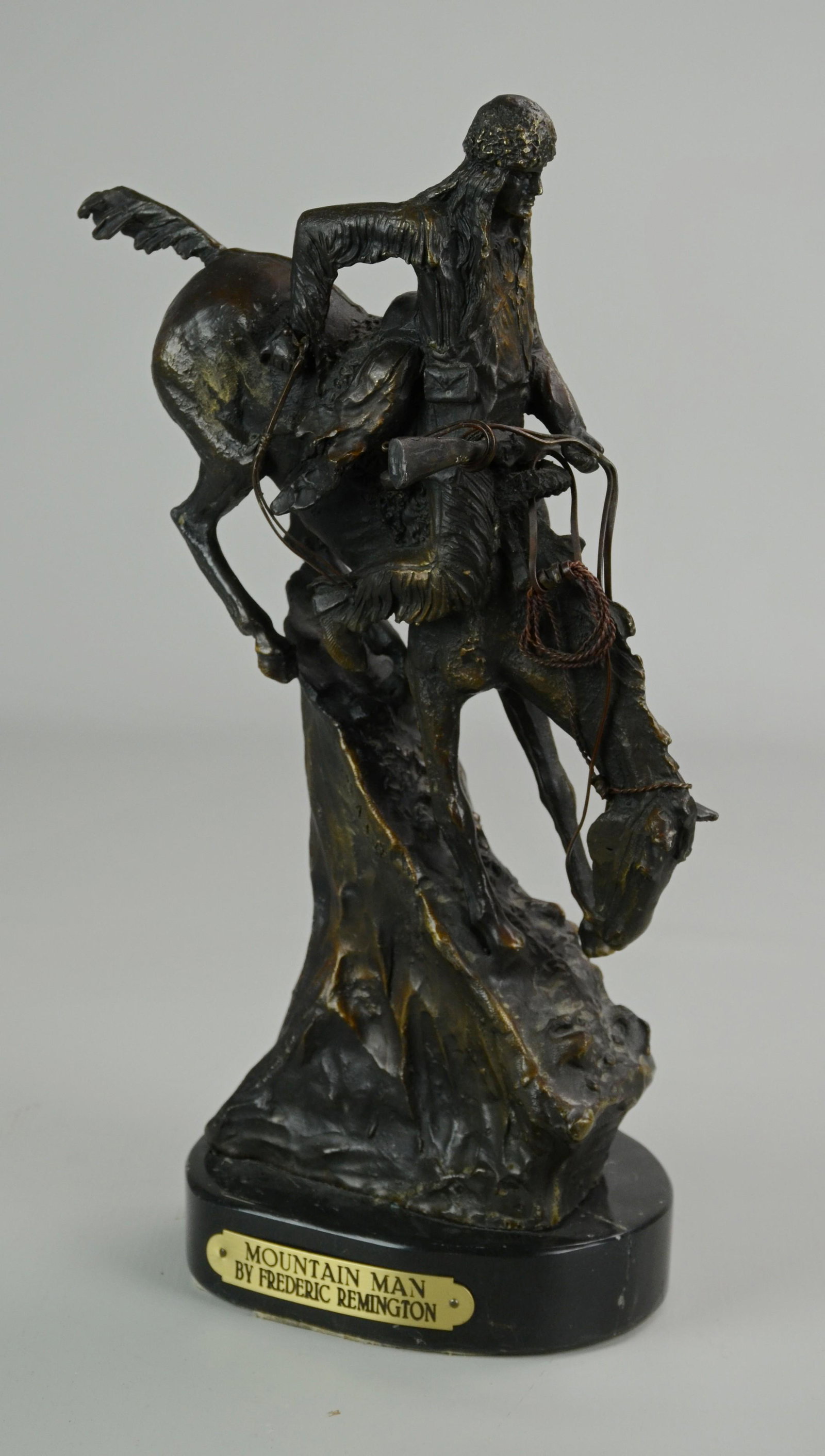 Bronze Mountain Man Sculpture after Remington: After Frederic Remington, bronze sculpture "Mountain Man", late 20th C, 14-1/4" h including marble base, good condition, crack in marble base