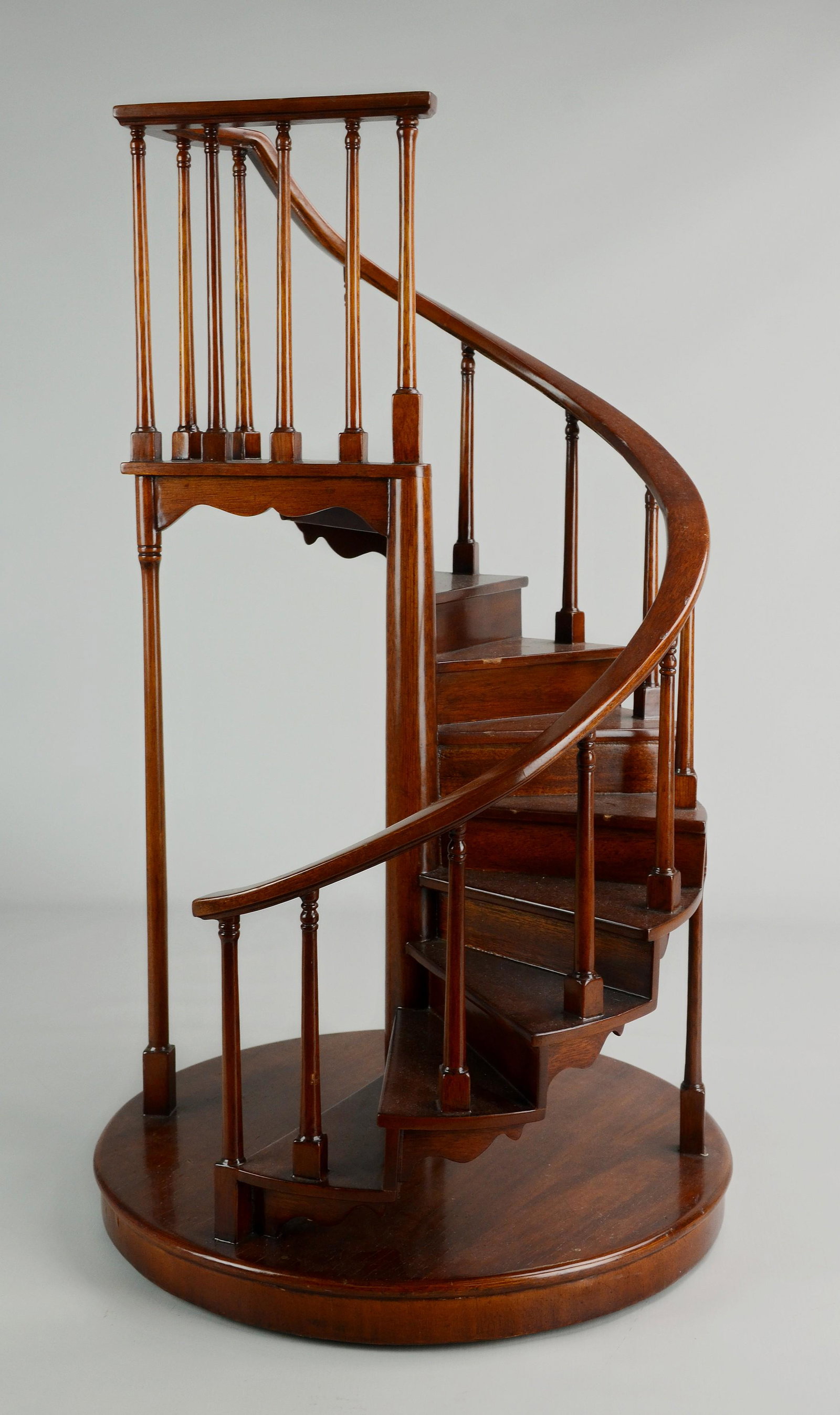 Mahogany Miniature Maitland Smith Staircase: Mahogany miniature Maitland Smith staircase. Ding on inner handrail approx 1/2", 24" H x 14" D