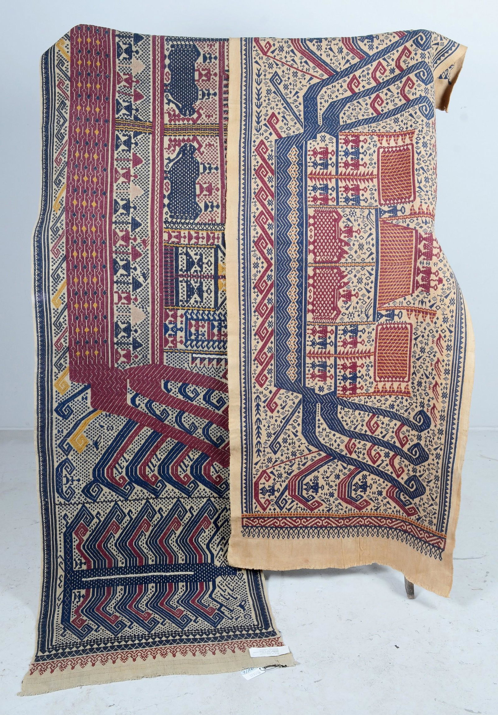 (2) 1930's Lampung Ships Cloths: (2) 1930's Lampung Ships Cloths c/o tan ground with navy and maroon embroidery in man and boat voyage patterns. 24" x 64" and 24" x 130"