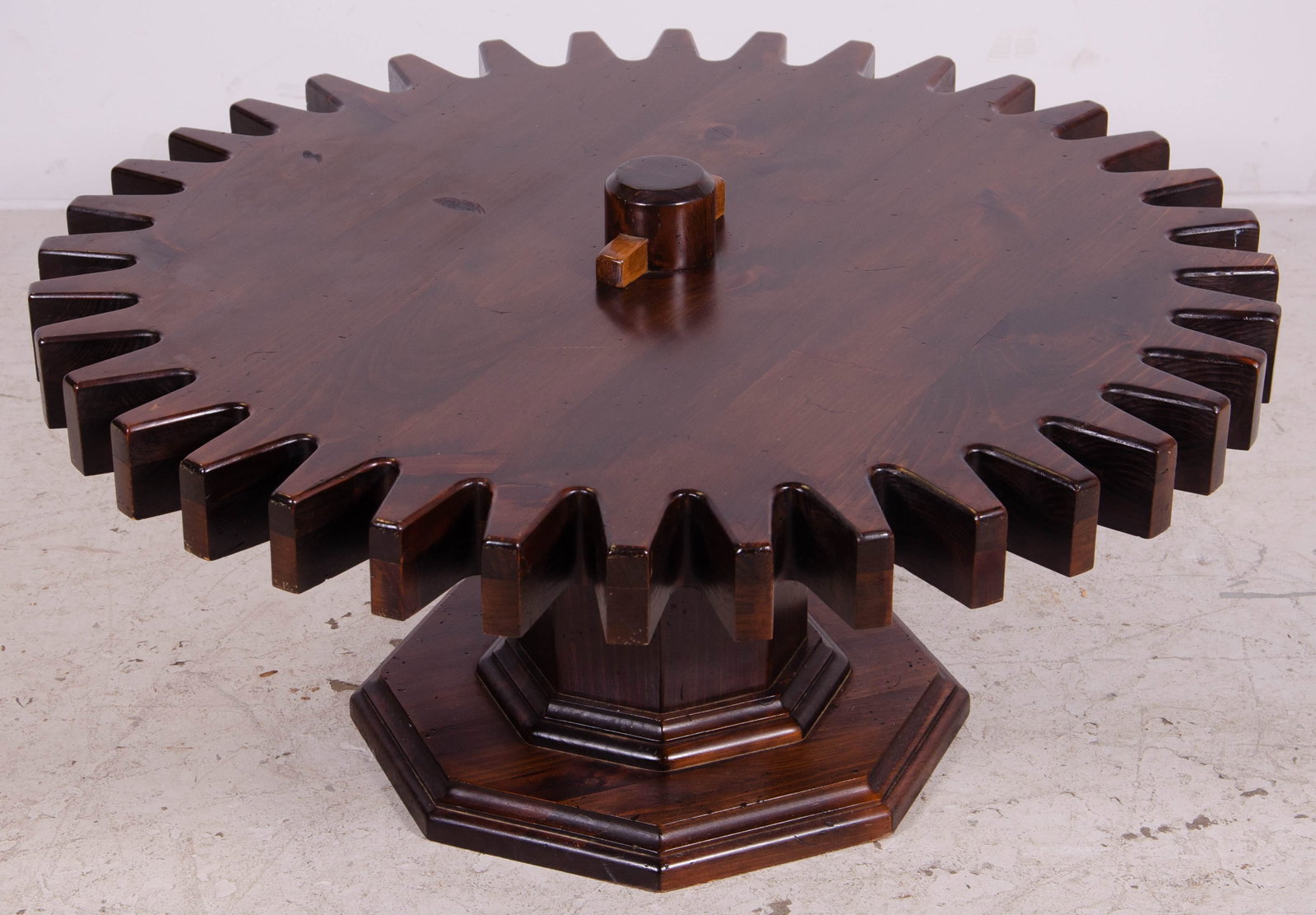 Ethan Allen Modern Design Cog wheel coffee table: Ethan Allen Modern Design Cog wheel coffee table, walnut, top spins, 17"h x 40"diameter, divits in top