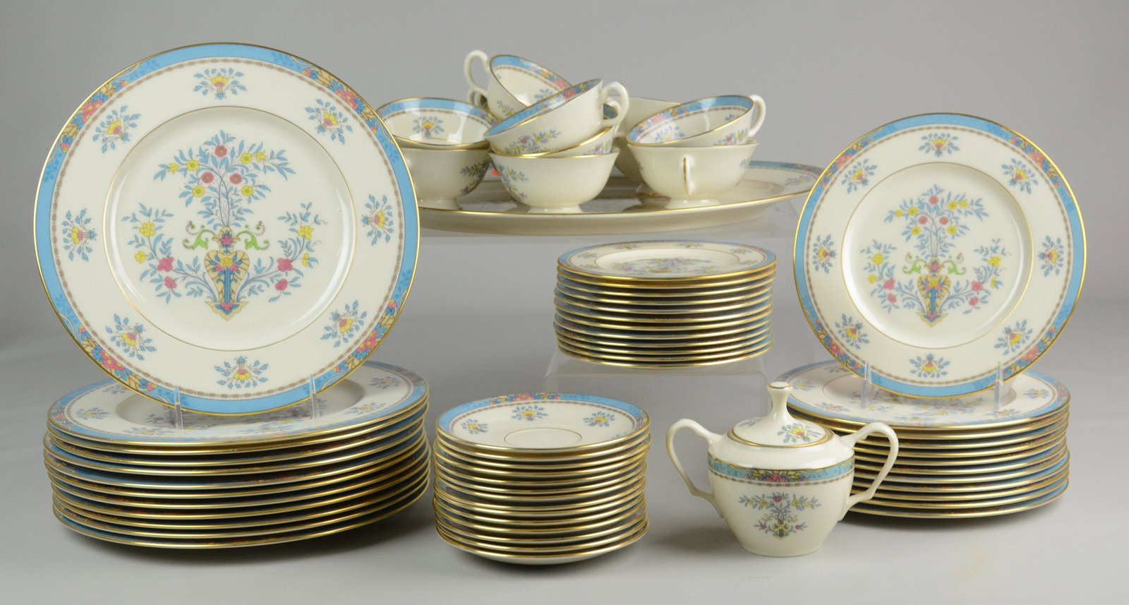 (64) Pcs Lenox Blue Tree Dinnerware: (64) Pcs Lenox porcelain dinnerware, Blue Tree pattern, c/o 12 dinner plates, 12 salad plates, 12 B&B plates, 12 teacups, 14 saucers, oval platter, sugar bowl