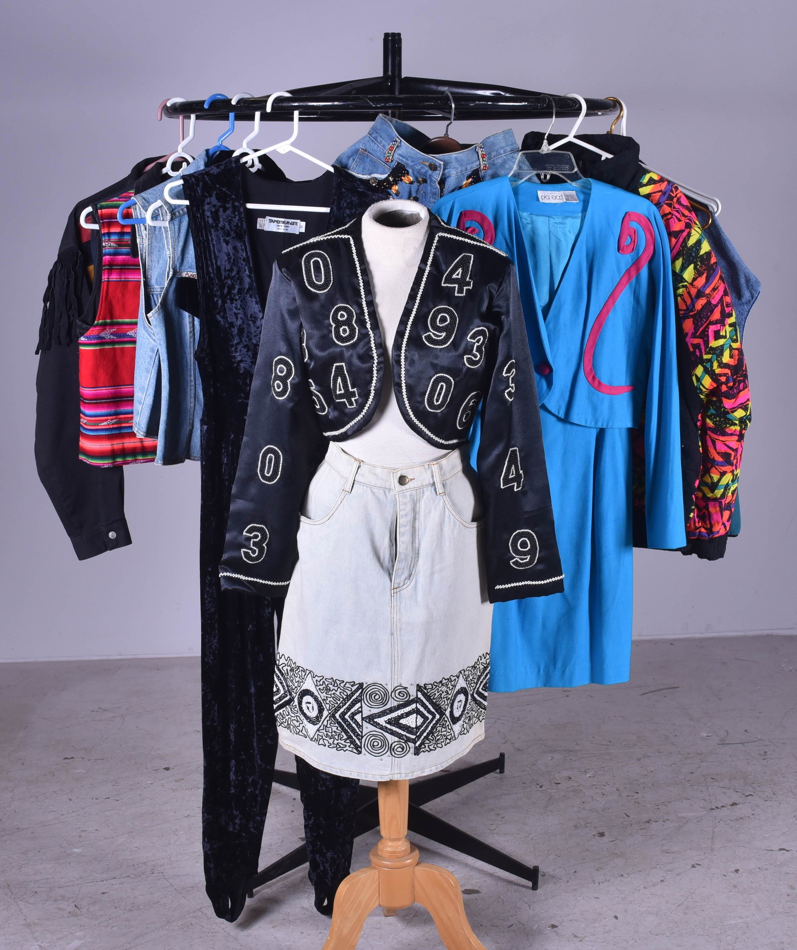 The 80's Are Back Starter Pack: The 80's are back starter pack c/o Tape Measure NY velvet jumpsuit, satin number beaded Sebato bolero, black denim and multi suede fringe cropped jacket, (2) Pr stone washed Gibraud Jeans, size 9/10 (