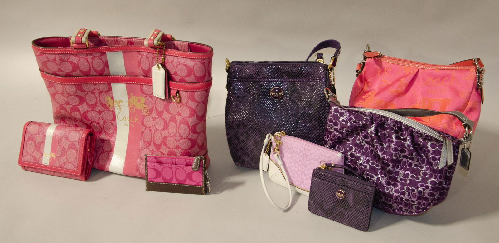 purple coach purse and wallet