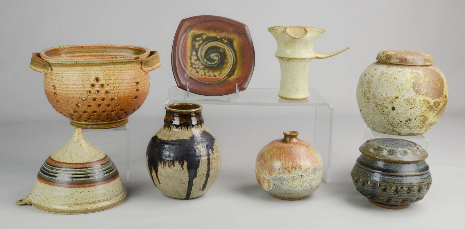 (7) Studio Pottery Articles: (7) Studio pottery articles c/o double handled colander, 7-1/2" diam 6" h, unsigned, Ellen Shankin pottery plate, 6-3/8" diam, Ellen Gaul bulbous form seed pot, 4-3/4" h, RC marked pottery funnel with