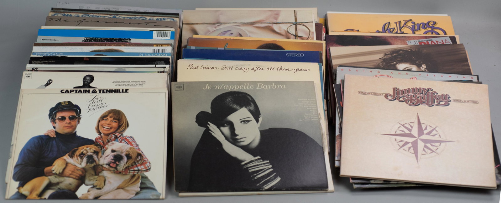 (100+) Vinyl LP Records, 1970s-80s: (100+) Vinyl LP records, 1970s-1980s, artists include Police, Genesis, Pointer Sisters, Buffett, Manilow, includes 19 without jacket