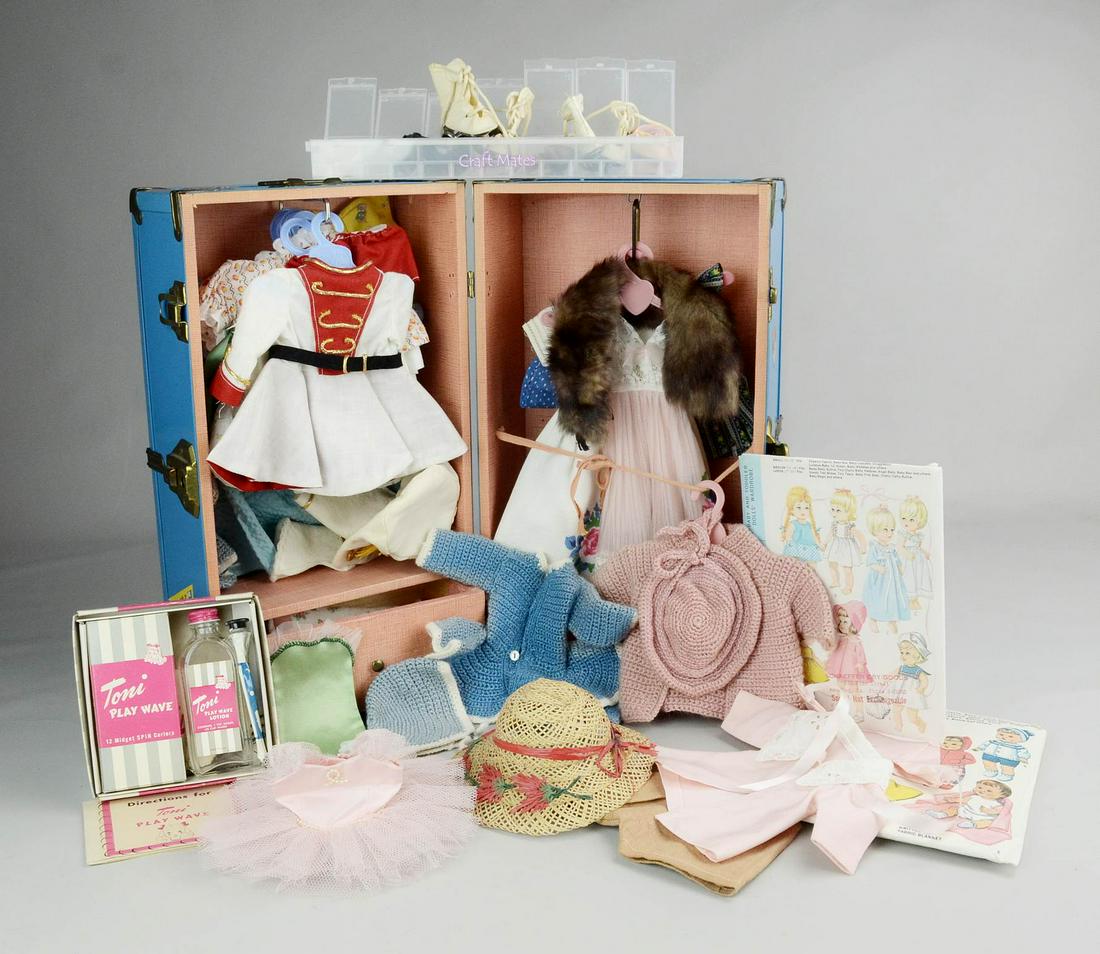 Blue Doll's Trunk and Contents: Blue dolls trunk and contents c/o Toni Play Wave hair styling kit, used, sweater, hat, ice skating outfit with hat, (4) sleep garments, (7) sun dresses, ballerina outfit, marching band outfit, mink st