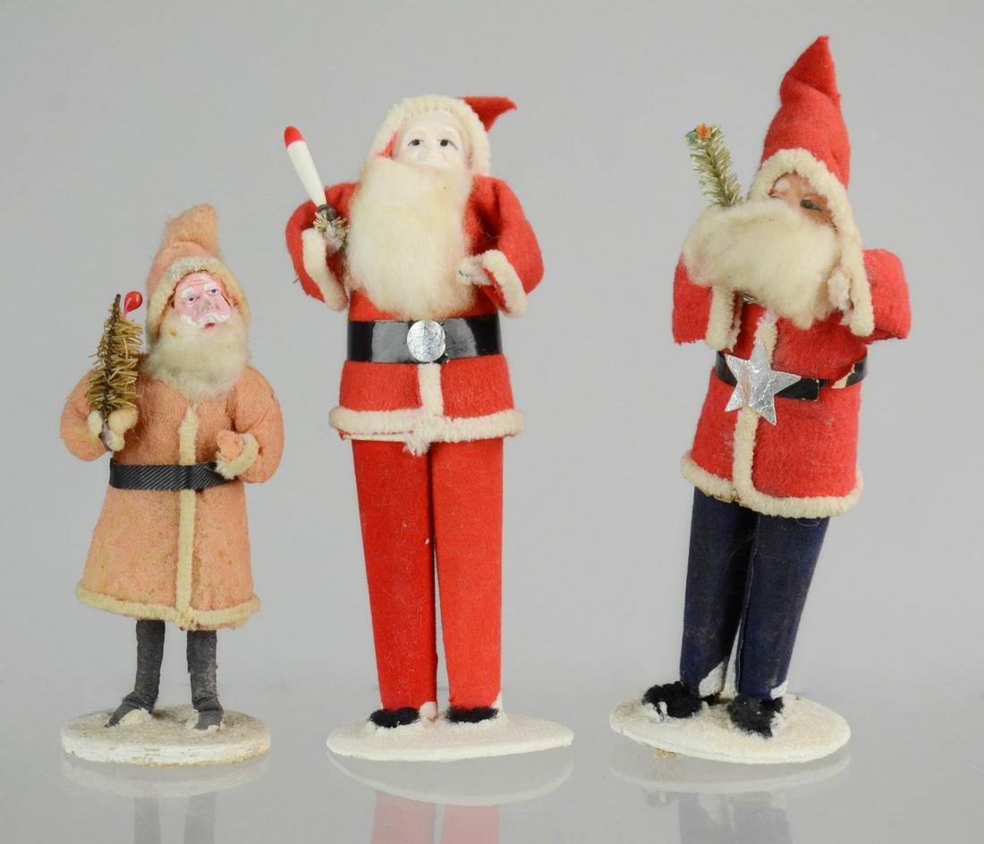 (3) Vintage Christmas Santa Figures: (3) Vintage Christmas Santa figurines, including one candy container, tallest 6-1/2"