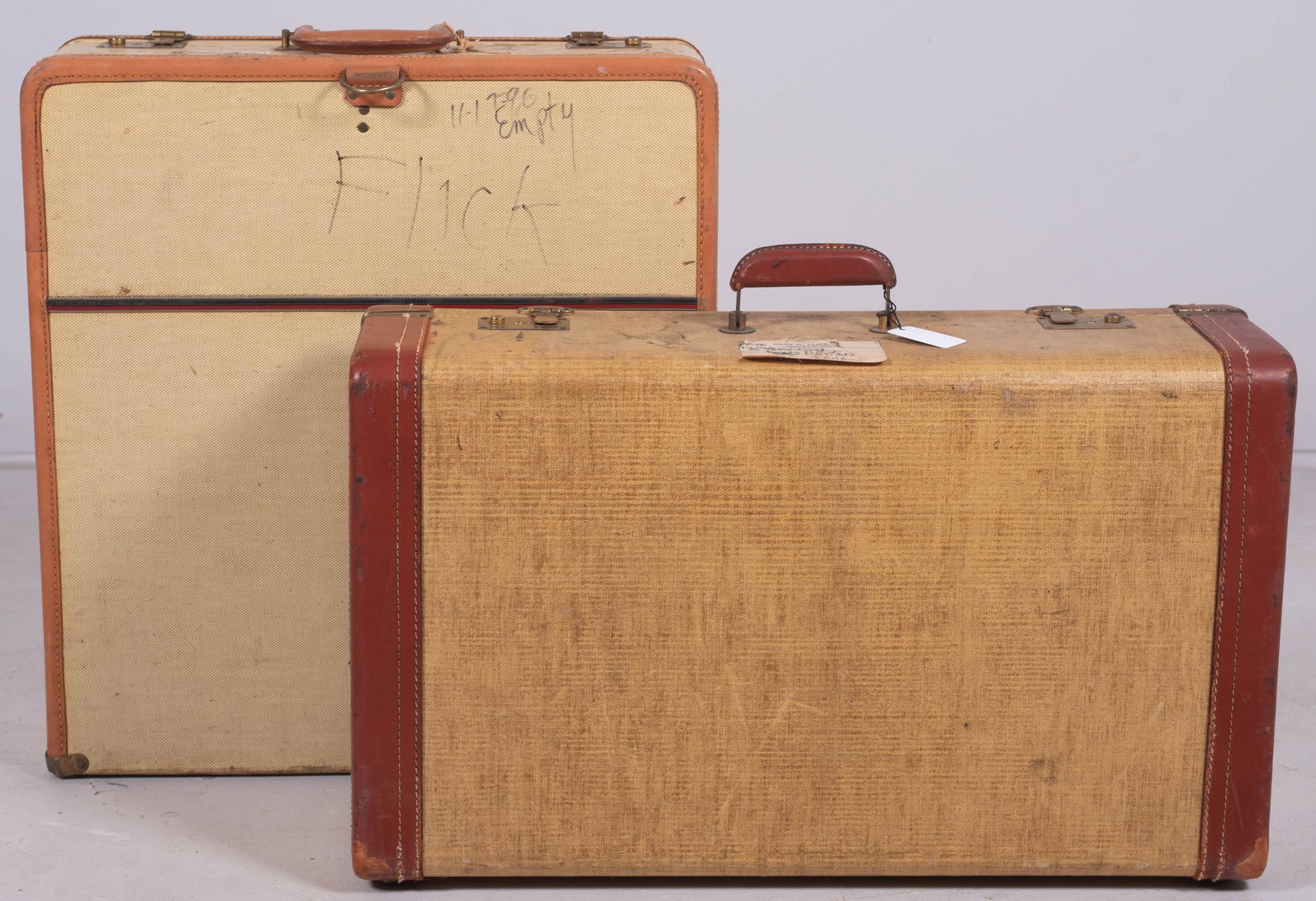 (2) Vintage Suitcases: (2) Vintage suitcases c/o (2) yellow grounded leather trimmed cases, 26" and 21", (1) Winship, (1) unmarked.