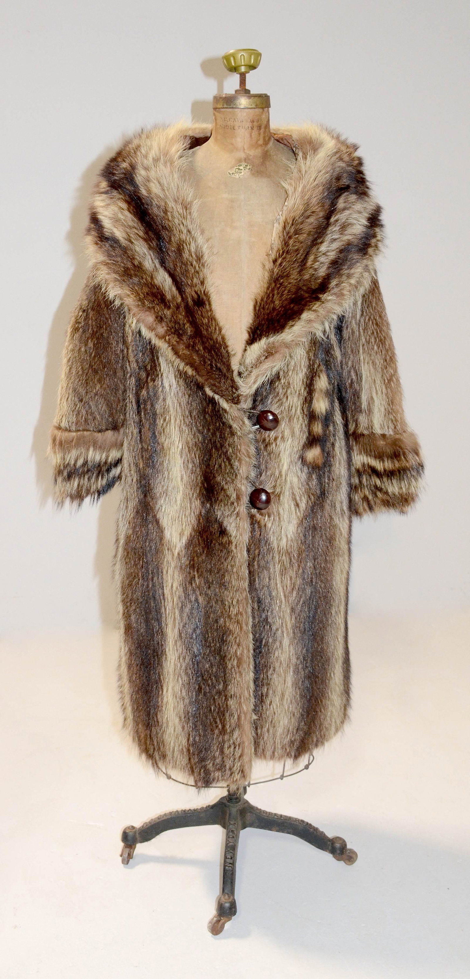Unsheared Antique Theo Siefert Fur Coat: Unsheared antique Theo Siefert fur coat, originally 1426 Walnut street 1910, Size M, small split under in underarm. Shawl collar and wide cuffed sleeves with (2) button closure and striped tail appliq