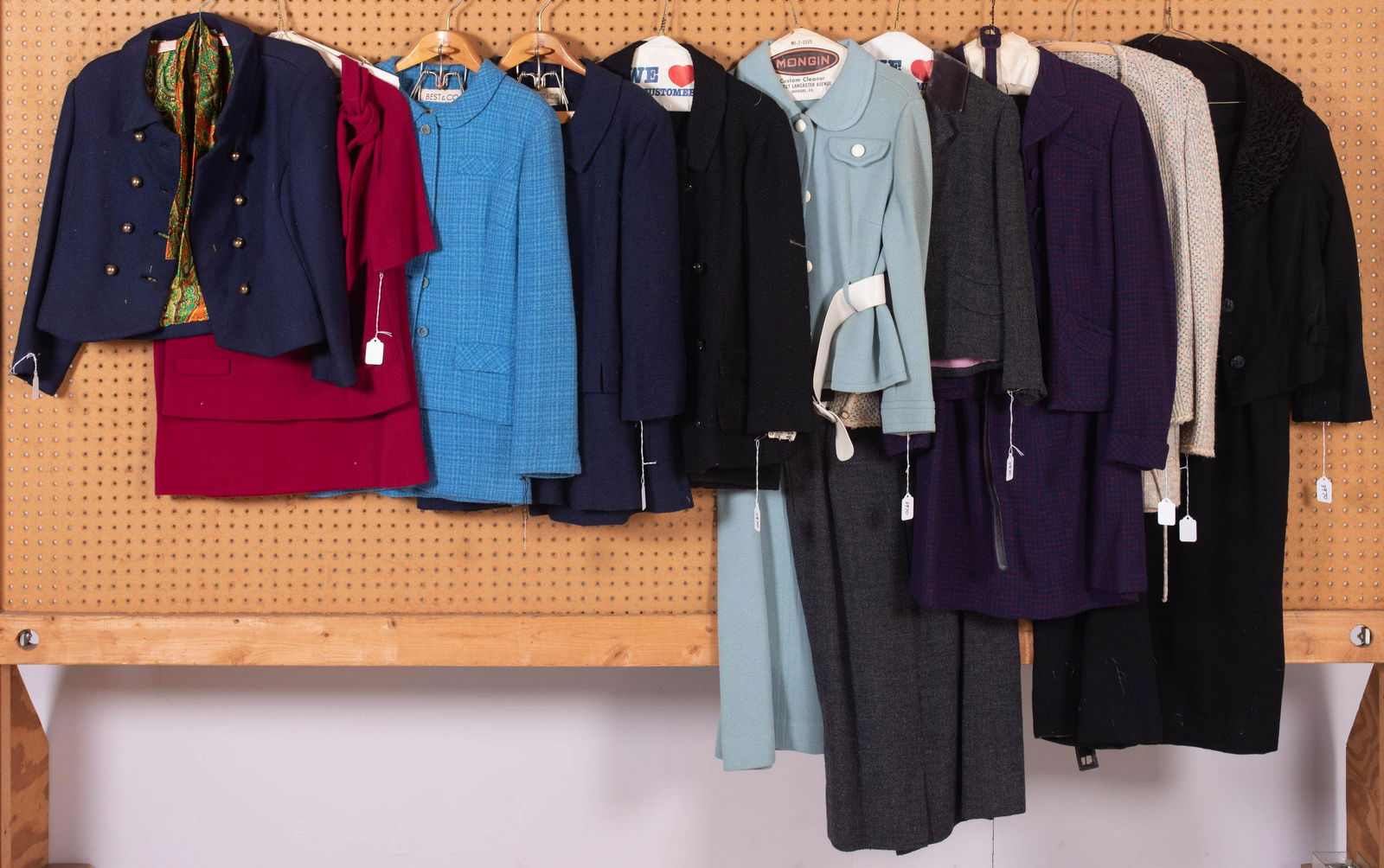 (9) Vintage Wool Suits: (9) Vintage wool suits c/o made to measure red and blue check skirt suit, Kimberly raspberry wool skirt and blouse, Lord and Taylor wool dress suit with curly lamb collar, made to measure funfetti woo