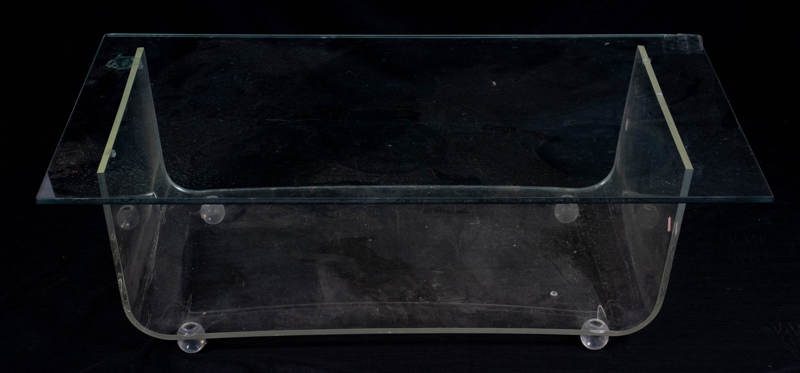 Modern lucite glass top coffee table: Modern lucite glass top coffee table, 15-1/2" h x 46-1/2" w x 26" d, one corner of glass with damage