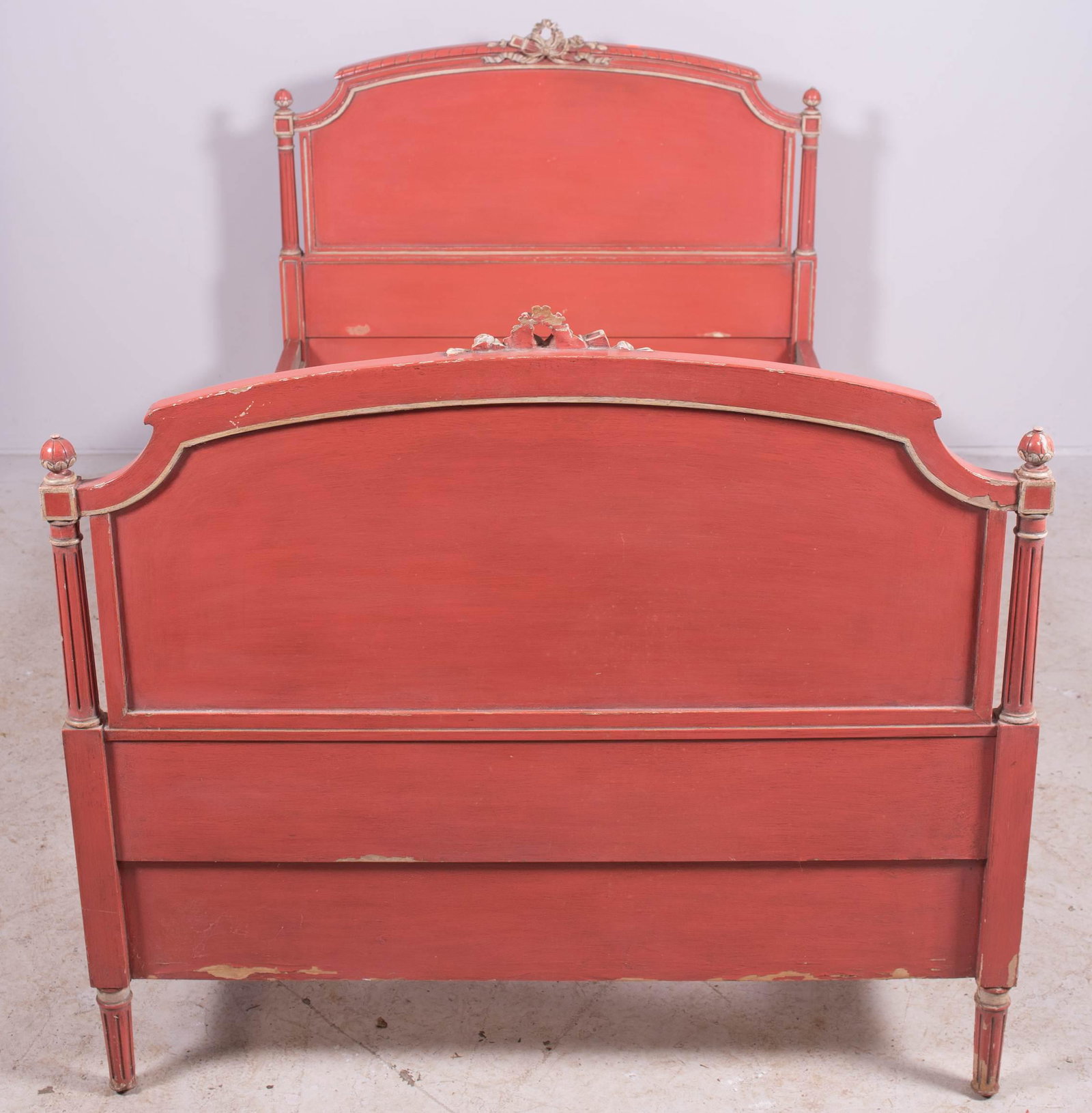 French style red and cream painted twin size bed: French style red and cream painted twin size bed, with bow crest, headboard 41" h x 45" w