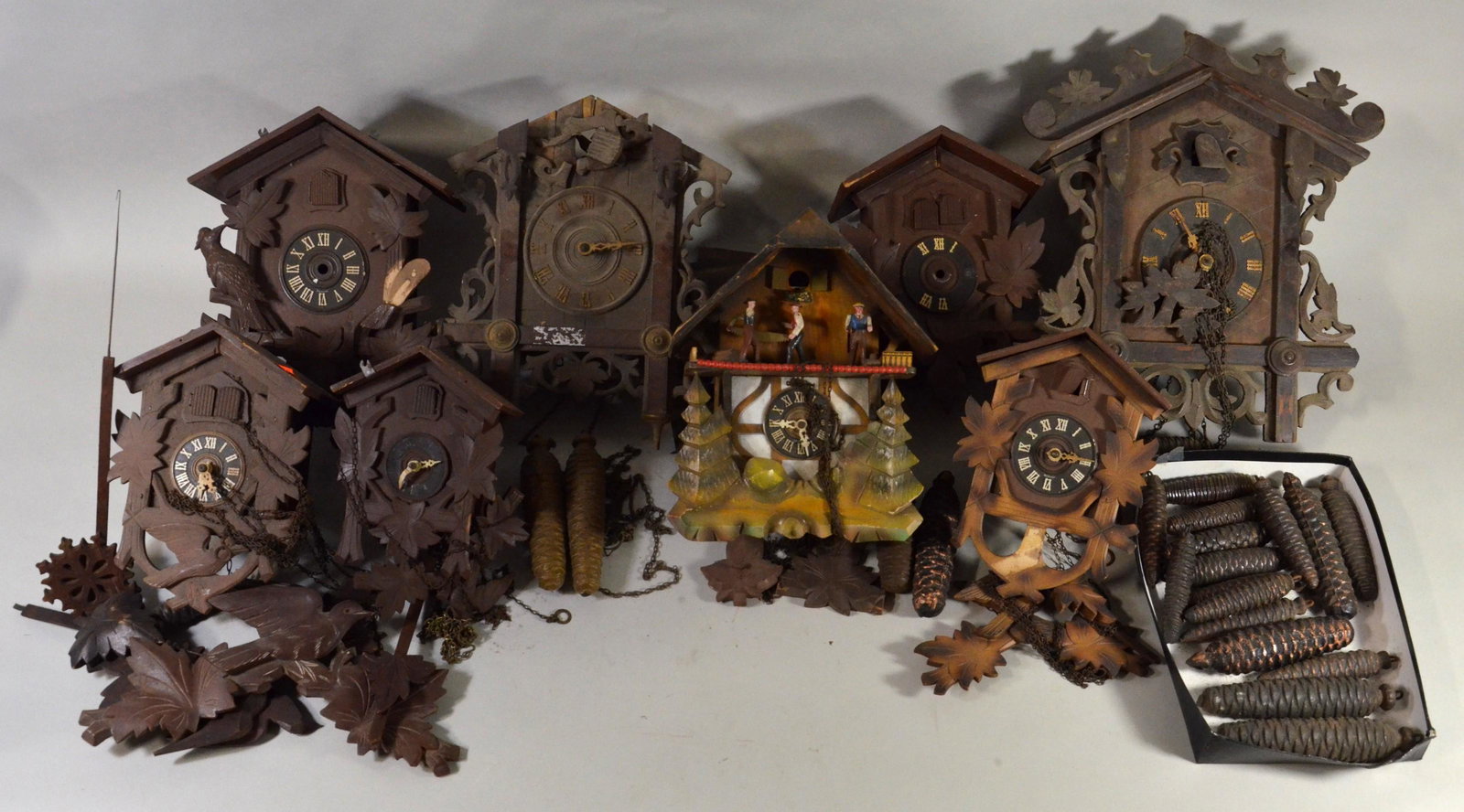(8) Cuckoo Clocks: (8) Cuckoo clocks, weights & pendulum, all for parts or repair