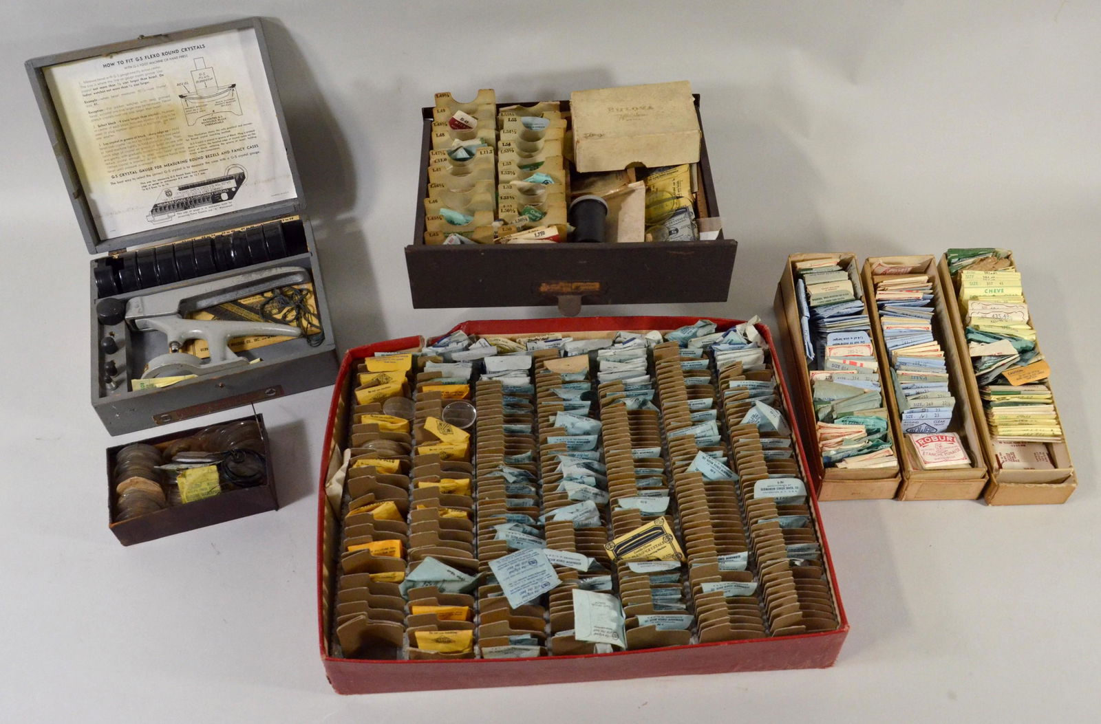 Large Lot of Watch Crystals: Large lot of watch crystals, most new old stock, & Flexo Crystal Hand Press in original box