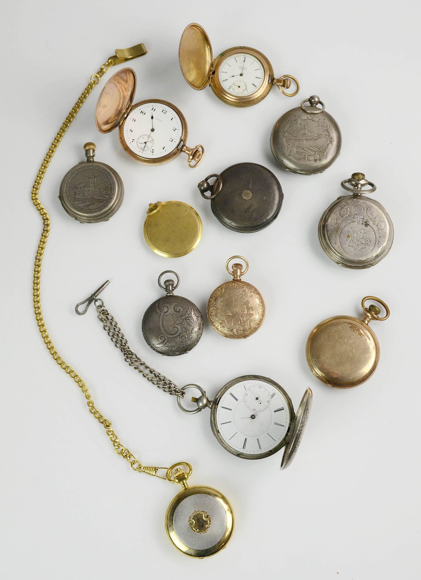 Mixed lot of Hunter Case Pocket Watches: Hunter Case pocket watch mixed gold filled lot with many vintage and antique watches some Elgins and others for parts, repair or restoration one pocket watch is Sterling, one is marked 800, total weig