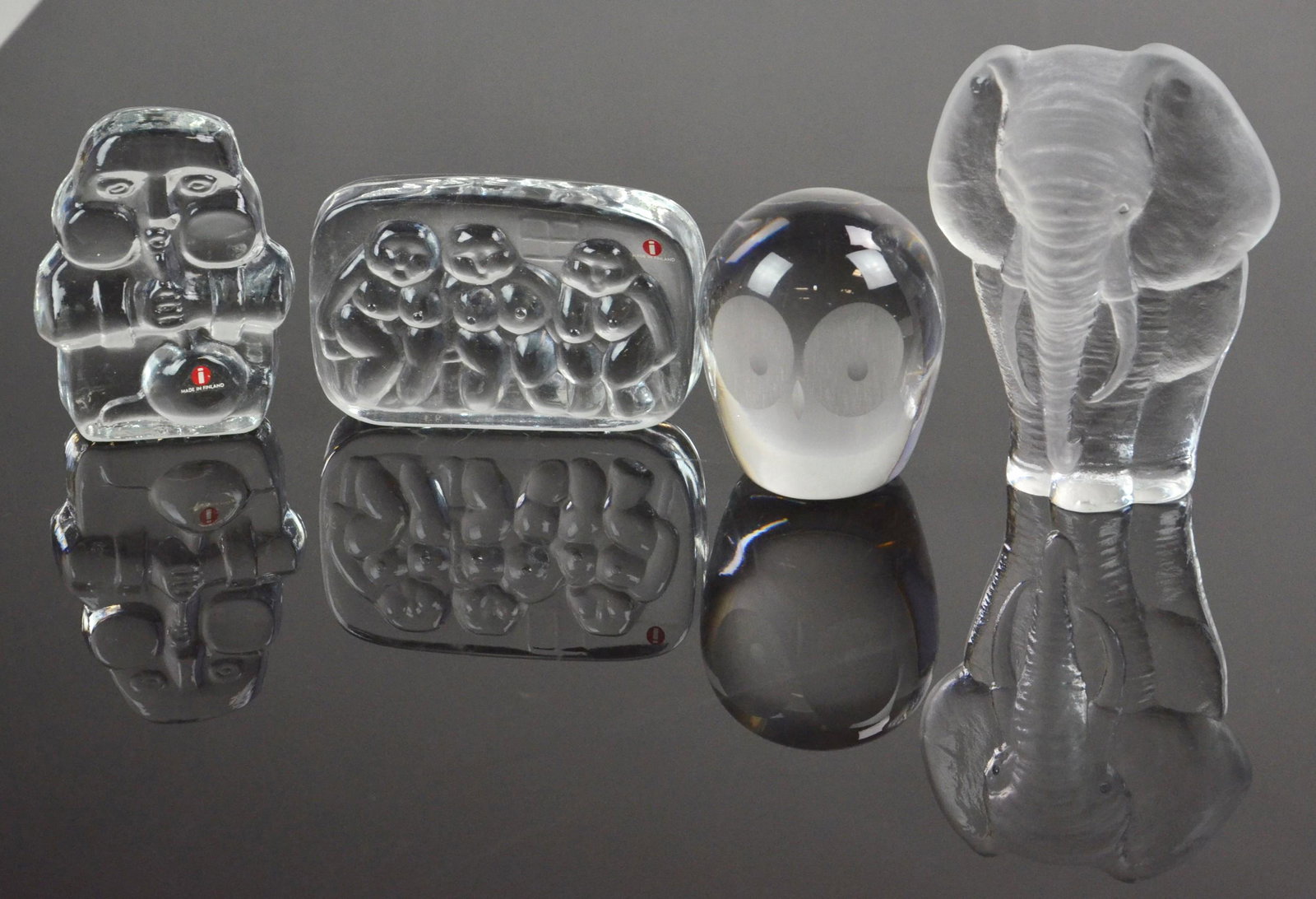 (4) Swedish and Finnish Paperweights: (4) Swedish and Finnish paperweights c/o Mats Jonasson elephant, 6", signed underside, Swedish style owl weight, unsigned, 4", Iittala 'glassblower', 4-1/2" and Iittala 'sauna', 5", both with original