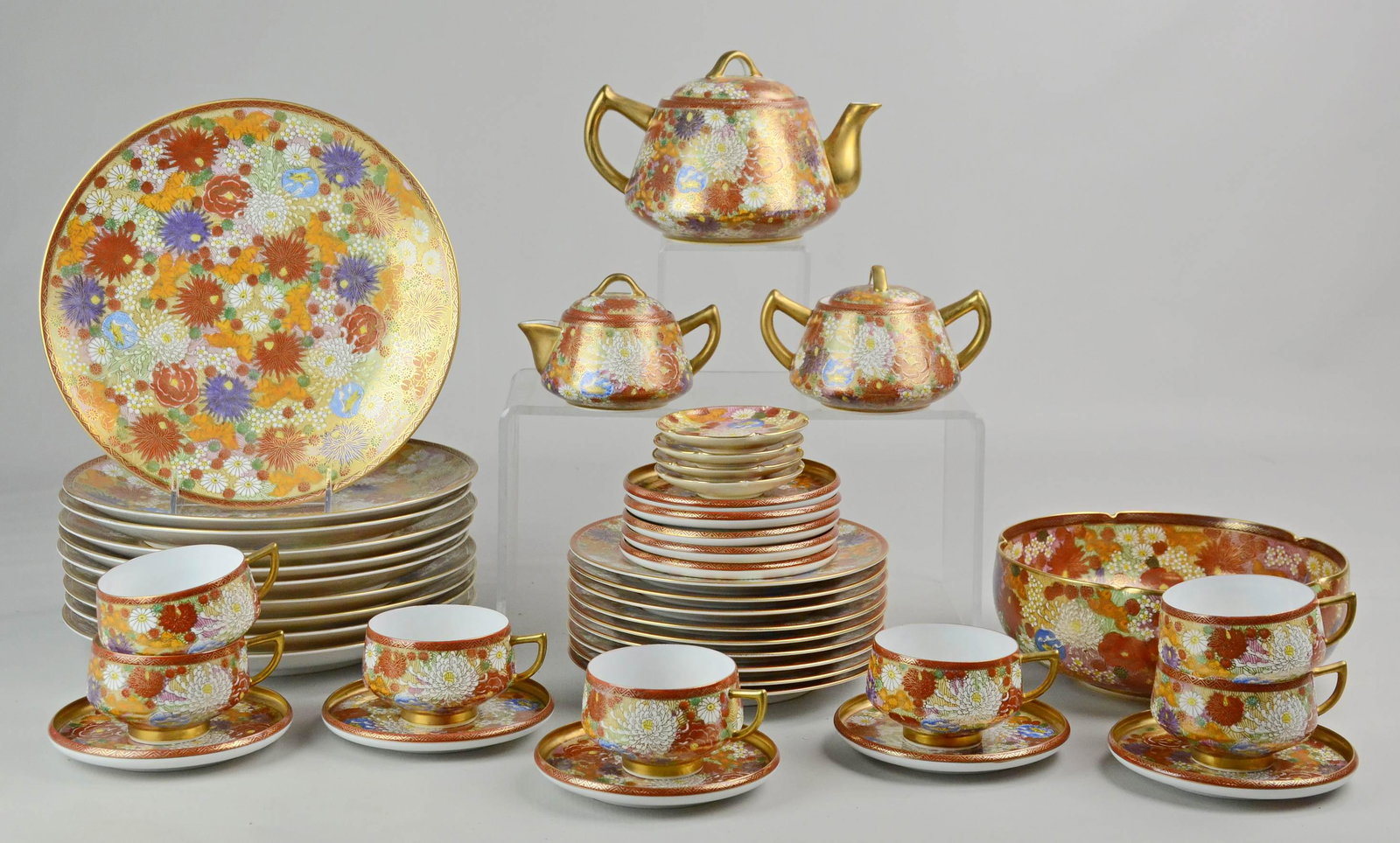 (43) Pcs Japanese Imari Lithophane Dinnerware: (43) Pcs Japanese Imari lithophane dinnerware c/o (10) dinner plates, (9) salad plates, (7) teacups, (10) saucers, (3) butter pats, (1) round serving bowl, (1) sugar, (1) creamer and (1) teapot. All p