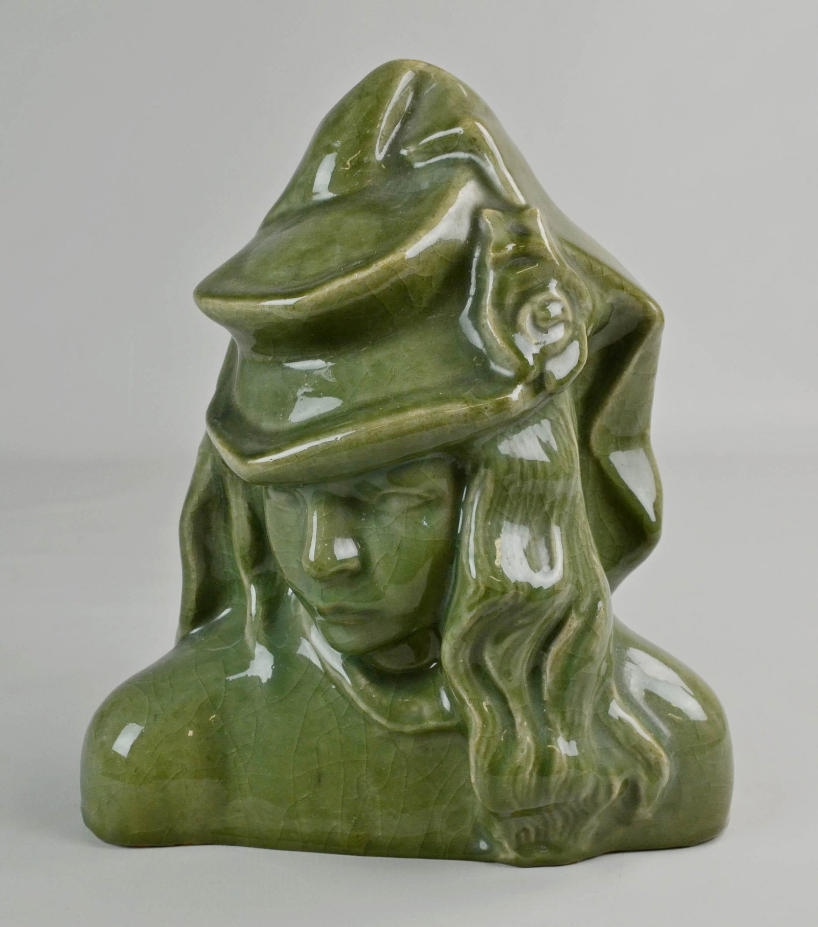 Helge Christoffersen Glazed Stoneware Bust: Helge Christoffersen glazed stoneware bust of a woman in crackle glaze signed Royal Copenhagen, 15" h, 12" L, wear to glaze on bottom, crazing to glaze