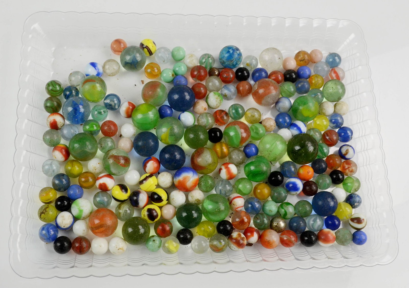 (100)+ Glass Marbles: (100)+ Glass marbles, largest 1" dia, smallest 1/2" dia
