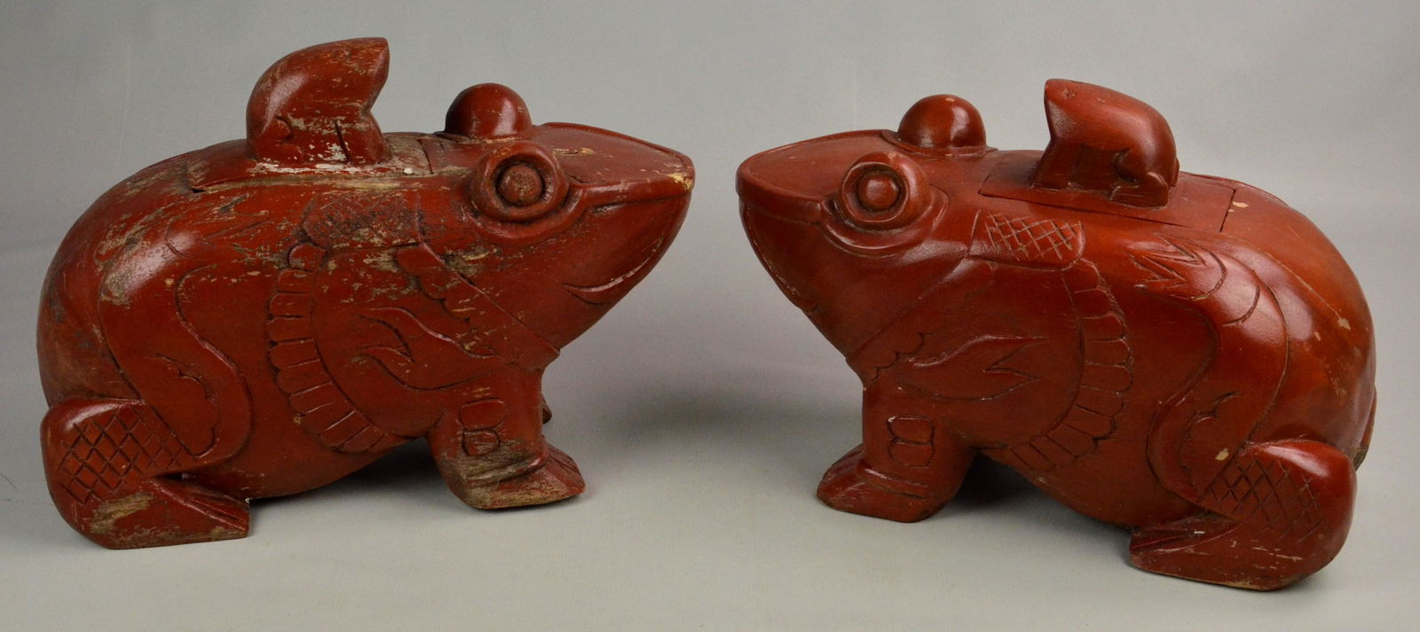 (2) Carved & Painted Wood Frog Boxes: (2) Carved & painted wood frogs, baby frog on back removes to reveal compartment, 17" l x 11-1/2" h, paint loss & wear