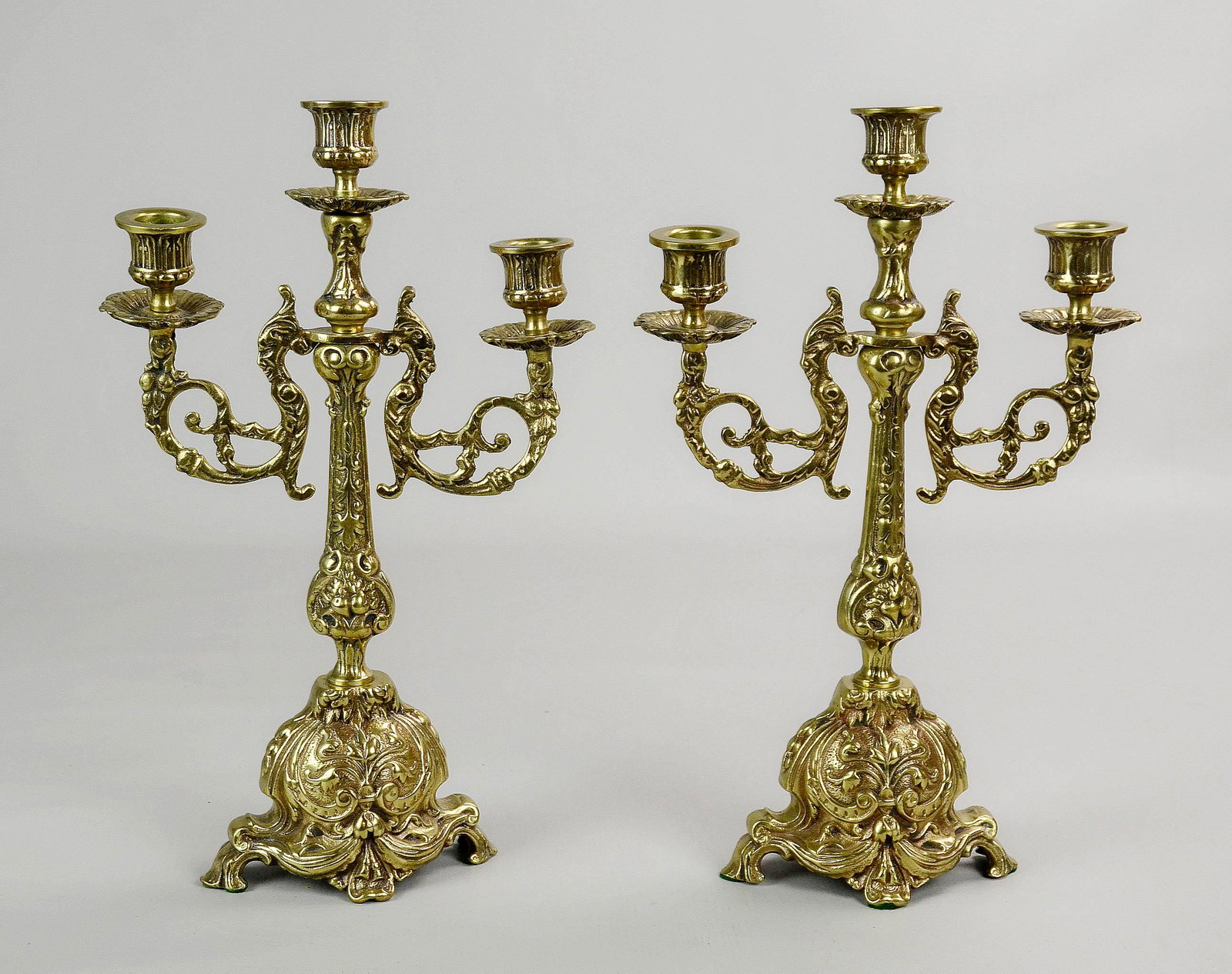 Pair of Rococo Style Brass Candelabra: Pair of elaborate Rococo style gilt bronze 3-light candelabra, 13-3/4" h x 8-3/4" w