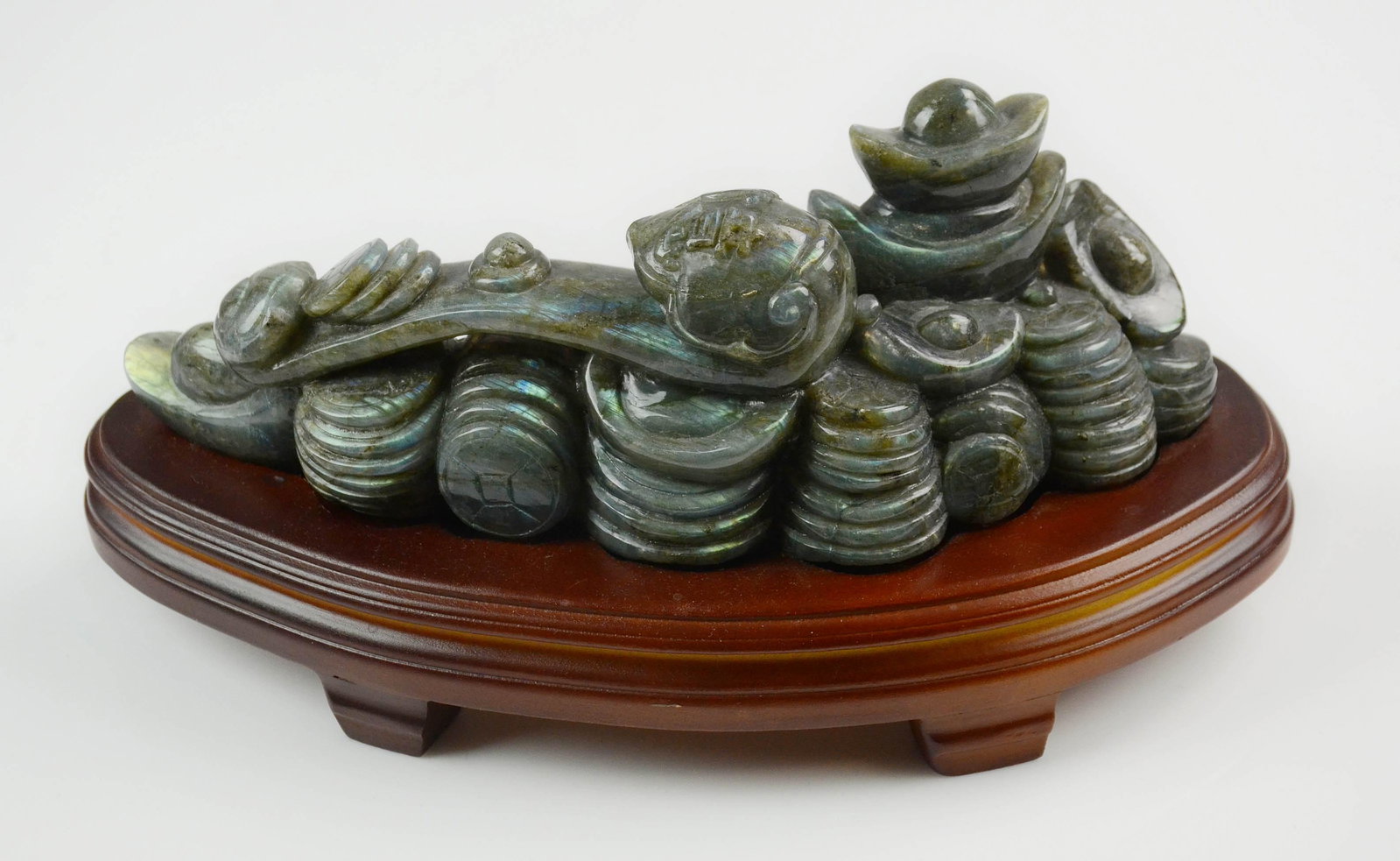 Chinese Carved Stone Ruyi Sculpture: Chinese carved stone sculpture, ruyi with coins, 9" l x 3-1/4" h, on fitted hard wood base