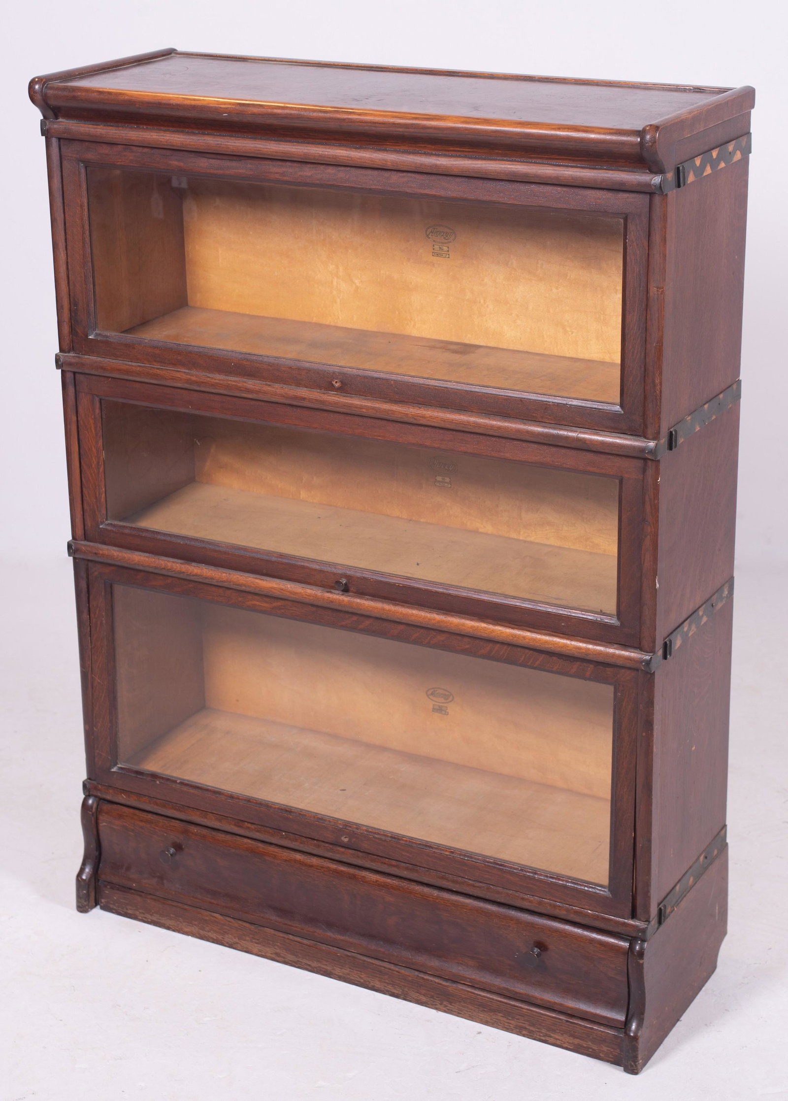 Macy oak 3 stack bookcase: Macy oak 3 stack bookcase, metal straps on sides, Series 98, finish 2, 47" h x 34-1/4" w x 19" d