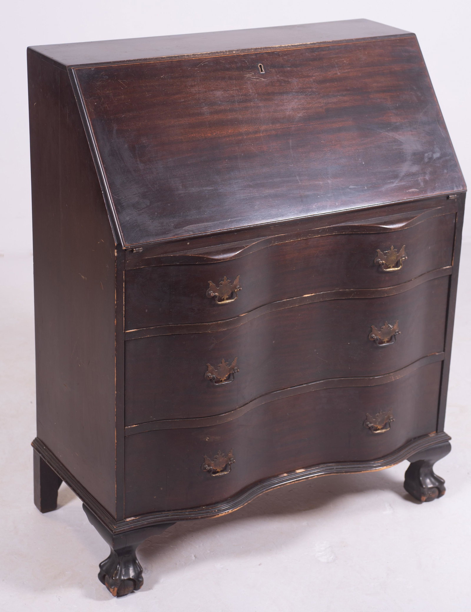 Mahogany Chippendale style slant front desk: H.P. Robertson Co mahogany Chippendale style Serpentine slant front desk, 43" h x 34" w x 17" d, wear and scratches
