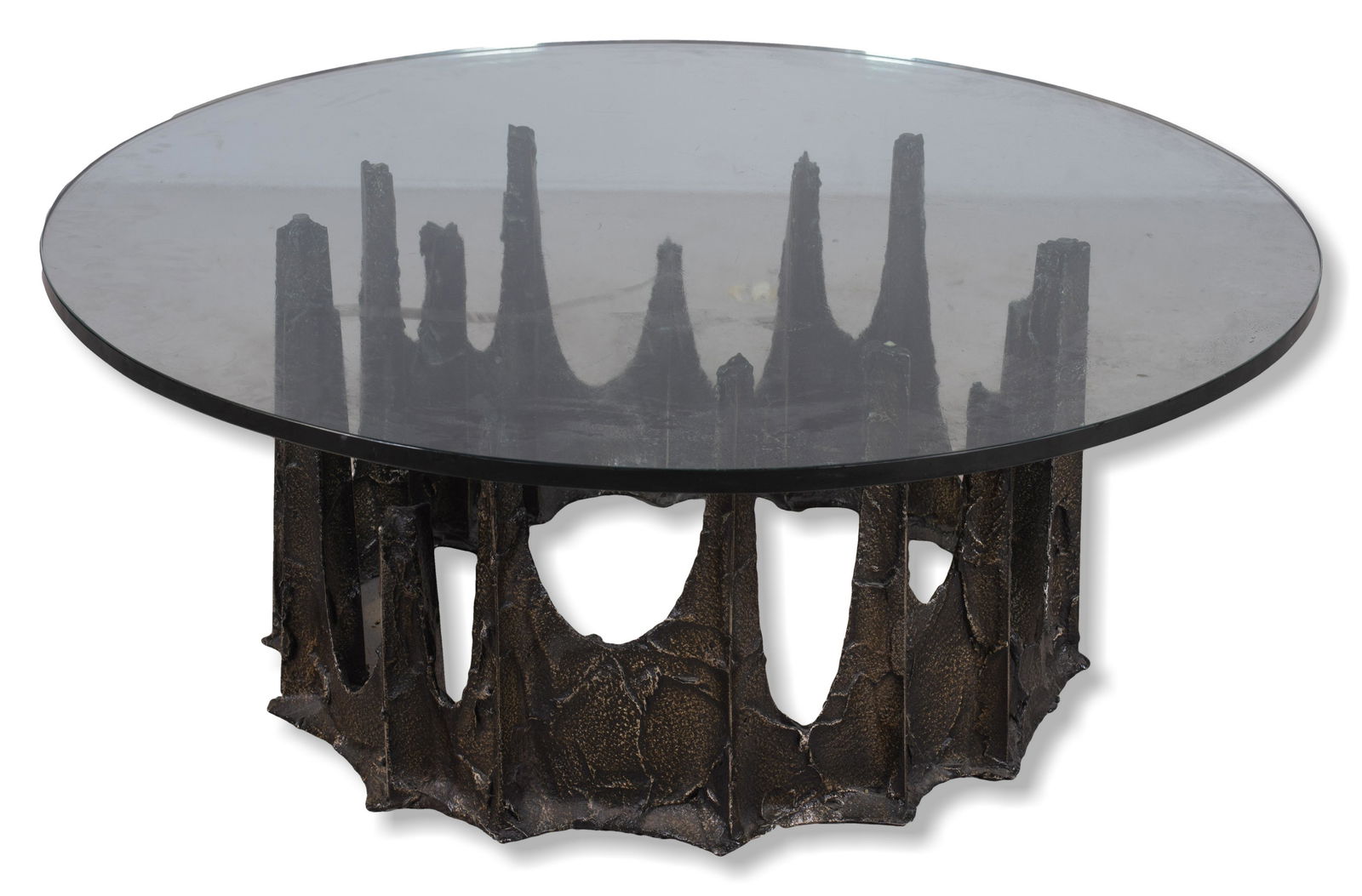 Paul Evans Brutalist coffee table: Paul Evans Brutalist coffee table, round glass top, metal stalagmite base, 16-1/2" h x 42" diameter, There are a few surface scratches on the top and bottom of the glass. No issues with the base.
