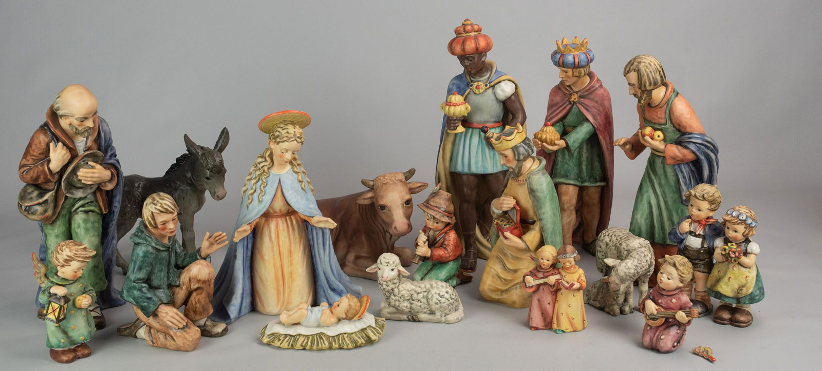 (16) Piece Large Hummel Nativity Set: (16) Piece large Goebel Hummel porcelain nativity set, TMK-5, most artist signed, c/o Madonna (260A), Saint Joseph (260B), Infant Jesus (260C), Good Night (260D), Angel Serenade (260E, wing needs repa