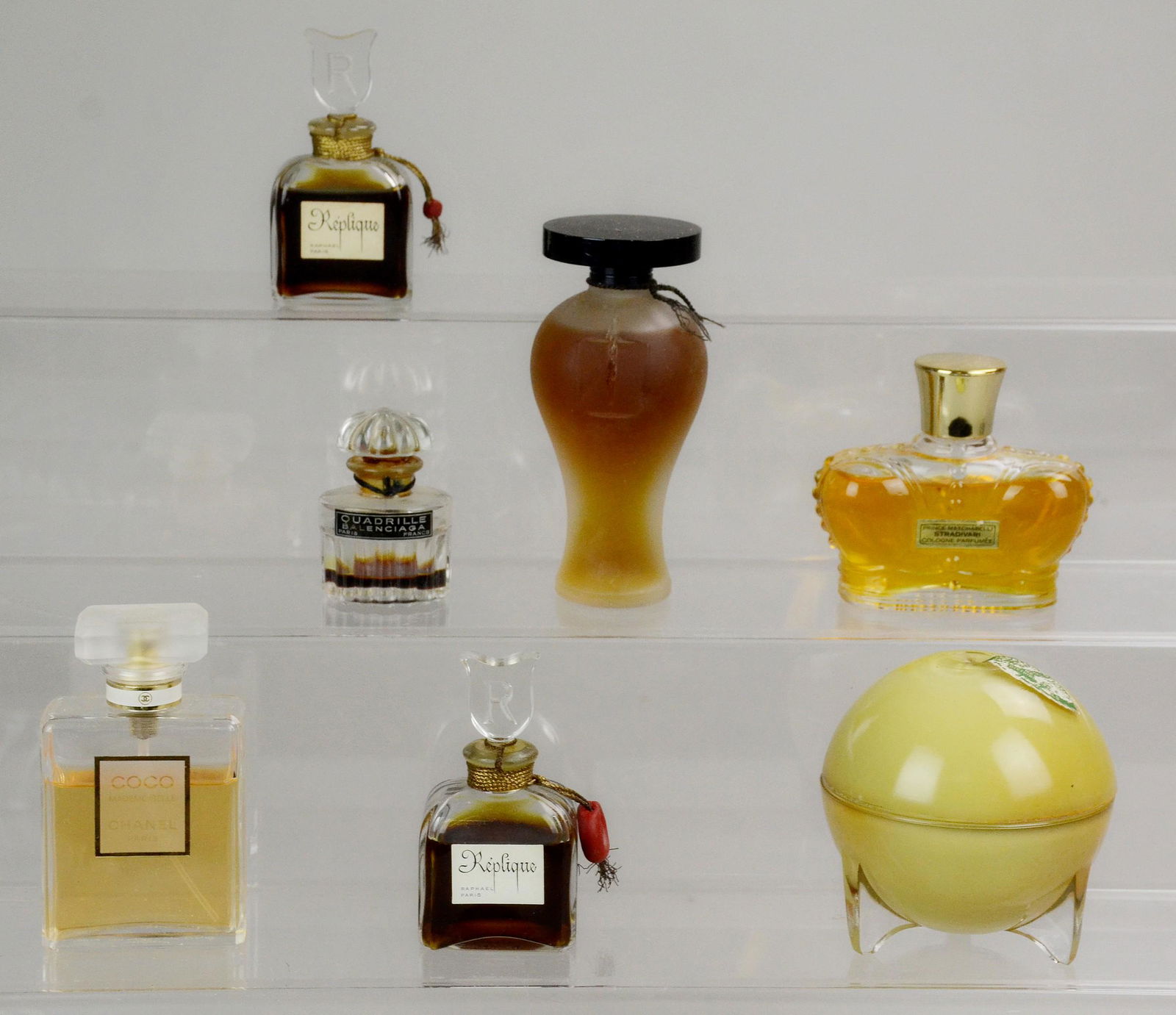 Vintage Perfume Grouping: Vintage perfume grouping c/o Duvinne New York Apple Blossom perfume in footed glass figural apple, no perfume remains, Quadrille Balenciaga, (2) Raphael Paris 'Replique' perfumes, Coco Chanel Mademois