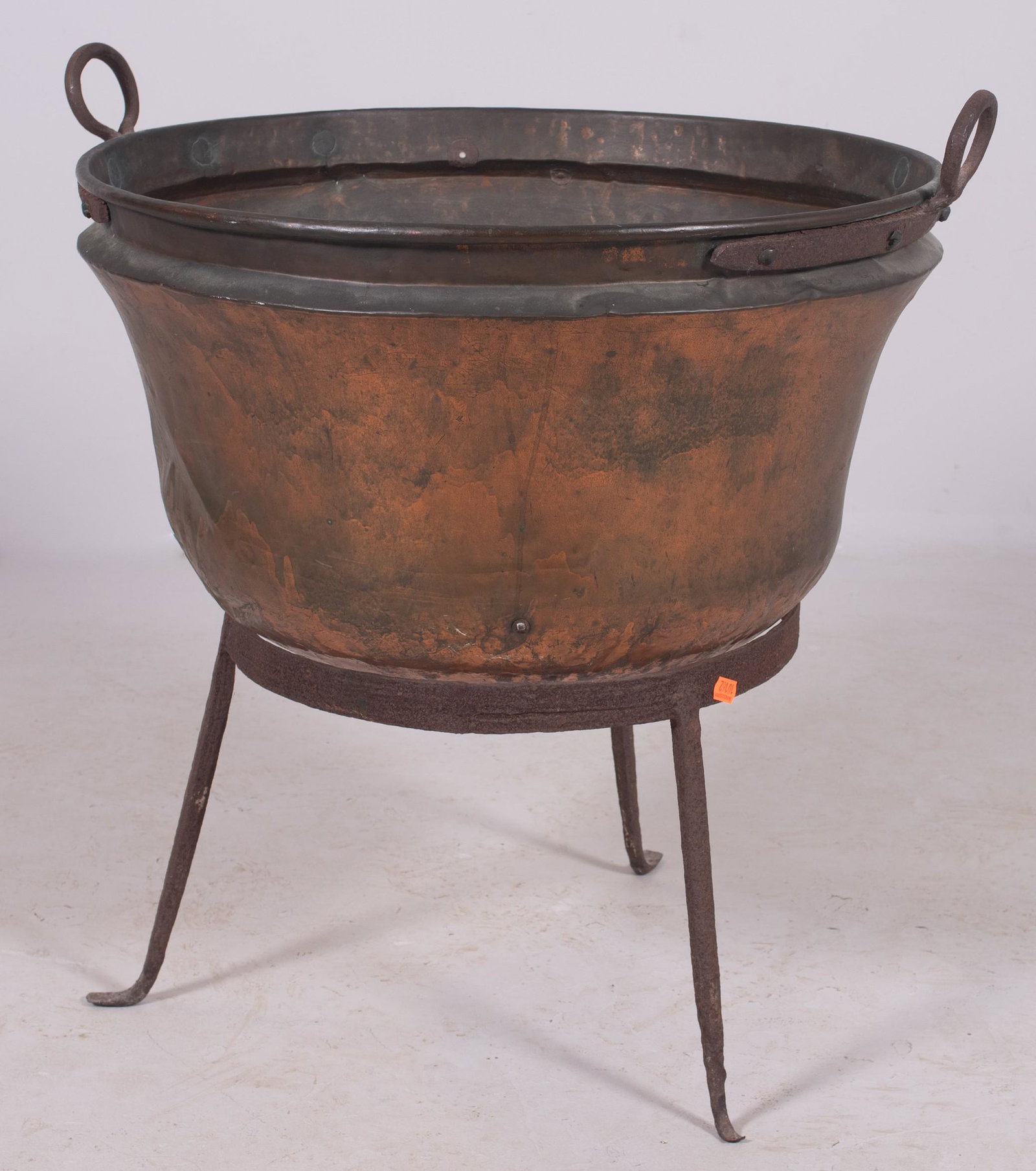Copper apple butter pot on stand: Copper apple butter pot on stand, 28-1/2" h x 23-1/4" diameter