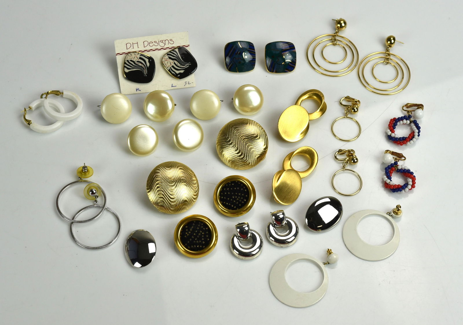 (16) Pc lot 1950-1980's Fashion Costume Earrings: (16) Pc lot of 1950's-1980's Style Costume fashion earrings, includes Givenchy gold disk earrings some marked, Monet, and Napier.