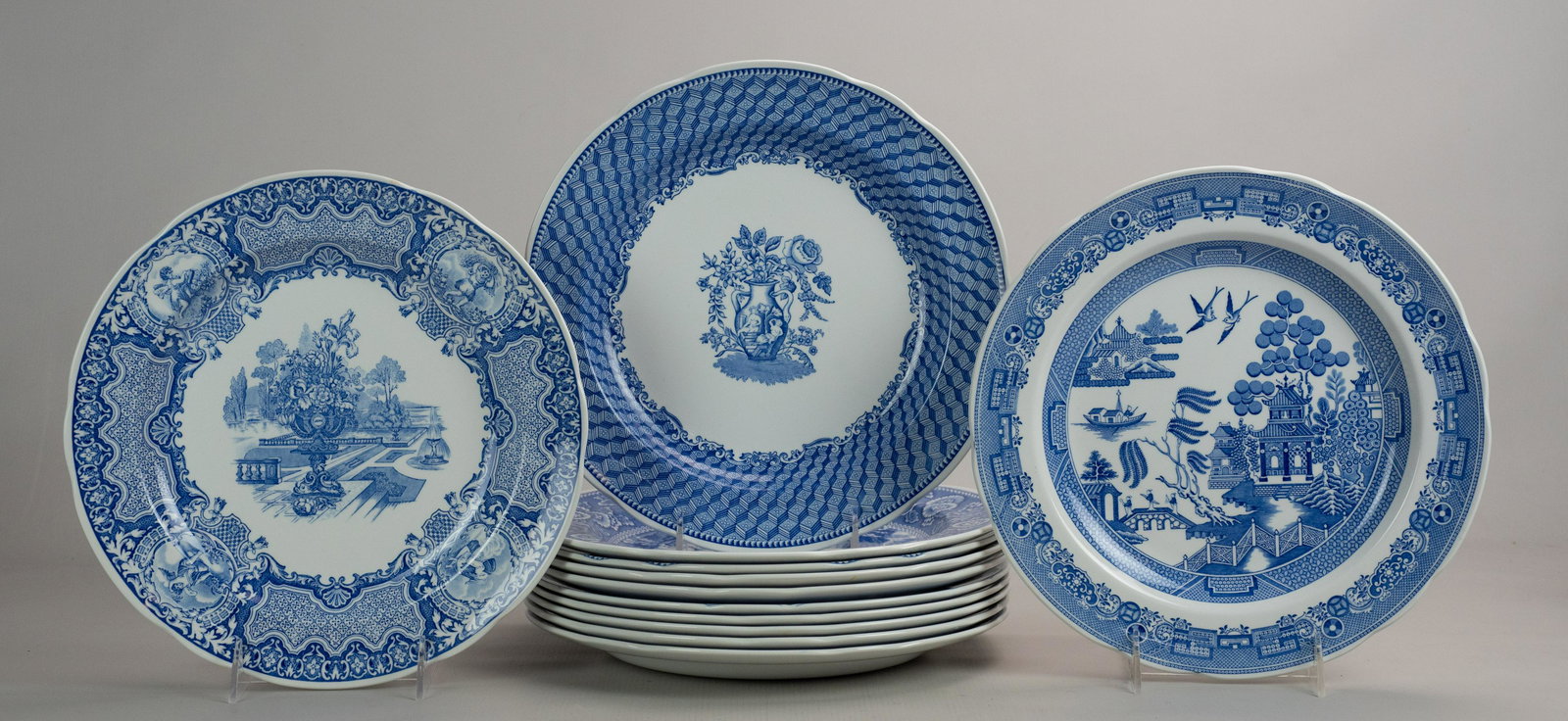(12) Spode Blue Room Plates: (12) Spode blue room plates, 10-1/4" in Continental Views, Girl at Well, Rome, Byron Groups, Botanical, Rural Scenes, Warwick Vase, Floral, Woodman, Portland Vase, Willow and Seasons.