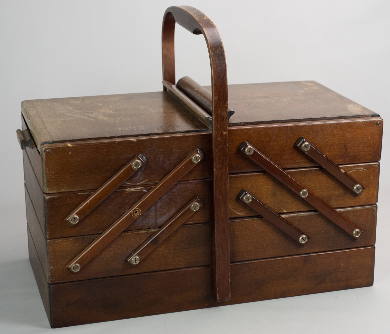 As Strommen Bruk Hamar Sewing Box: As Strommen Bruk Hamar sewing box, tiered lift out interior with handle, includes interior sewing items, missing legs. 20"x11"x17"