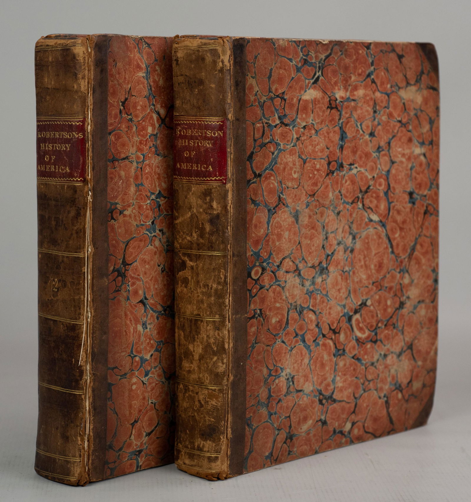 1778 "The History of America" Robertson, Complete in: William Robertson "The History of America" in Two Volumes (Strahan, London 1778); second edition - 4to, Vol 2 front board is detached, - With 4 folding maps. Both include the bookplate of Abel Anthony