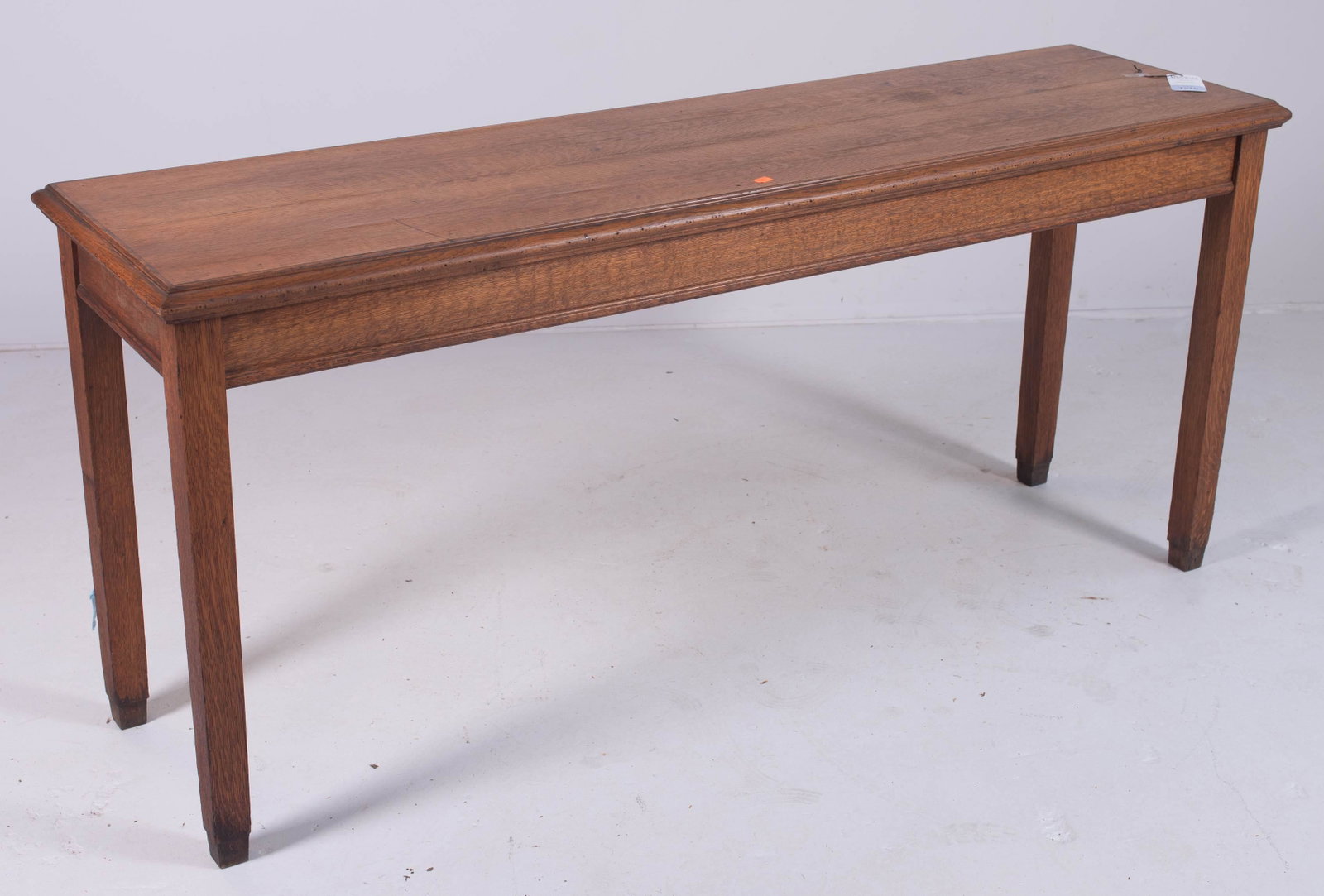 Walnut console table: Walnut console table, 32" h x 71-1/2" w, some ripples to veneer on top, missing foot caps