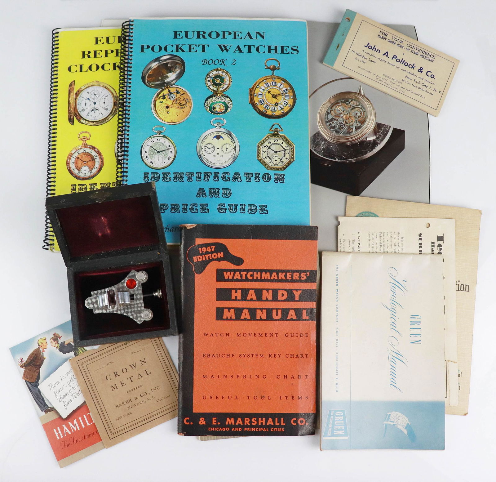 Watch & Clock Books & Repair Clamp: Clock & watch books, including European Repeaters & Clock Watches Book 1 & European Pocket Watches Book 2 Identification and Price Guide by The Ehrhardts, Parmigiani Fleurier 1996 catalog, Gruen Horol