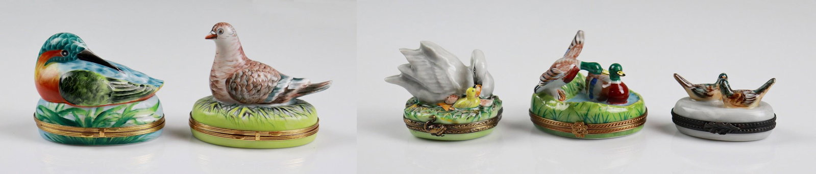 (5) Bird and Duck Decorated Porcelain Trinket Boxes: (5) Bird and duck decorated porcelain trinket boxes c/o mallard pair topped trinket marked Limoges at underside, swan with hatchling topped trinket marked Chamart Limoges at underside, lovebird pair t