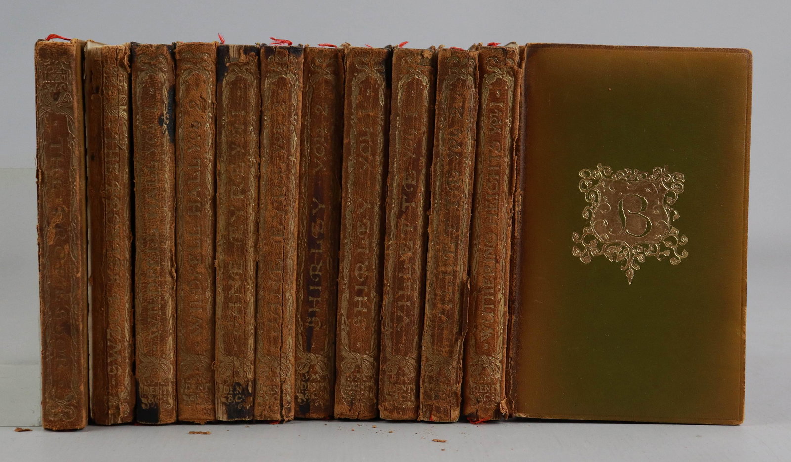 Works of the Brontes 12 Volumes: Works of the Brontes, J.M Dent & Co., Alidine House, Bedford Street, W.C, 12 volumes, including Wuthering Heights, Vilette, Wildfell Hall, Shirley, Jane Eyre, The Professor and The Brontes Poems. Gilt
