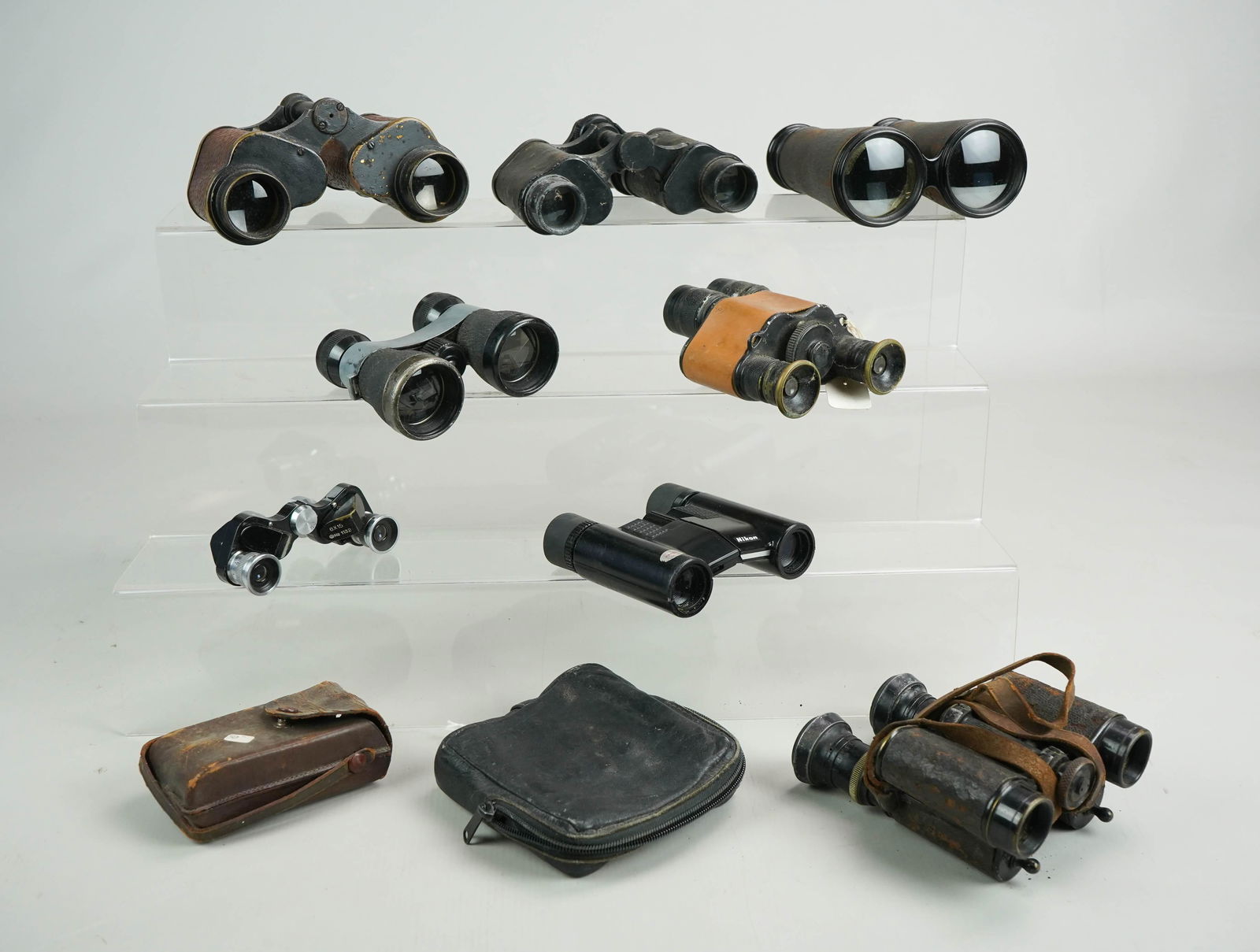(8) Pair Binoculars: (8) Pair of binoculars, including OVO 6 x 15 No 1132, Rambler 4x, Huet Paris, Lemaire Fab Paris, Hensoldt Artillerie 8x24, Heesch Optical Military Stereo 6x30, Nikon 7 x 20 538397