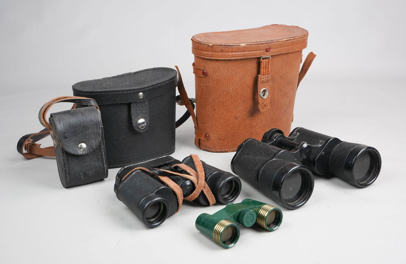 (3) Pair Binoculars, Russian, German: (3) Pair of binoculars, c/o Baigish Reticle 8 x 30 150m/1000m made in Russia, green Art Deco opera glasses 25 x 25 made in USSR, Carl Zeiss Jena Binoctem 7x50, all with original cases