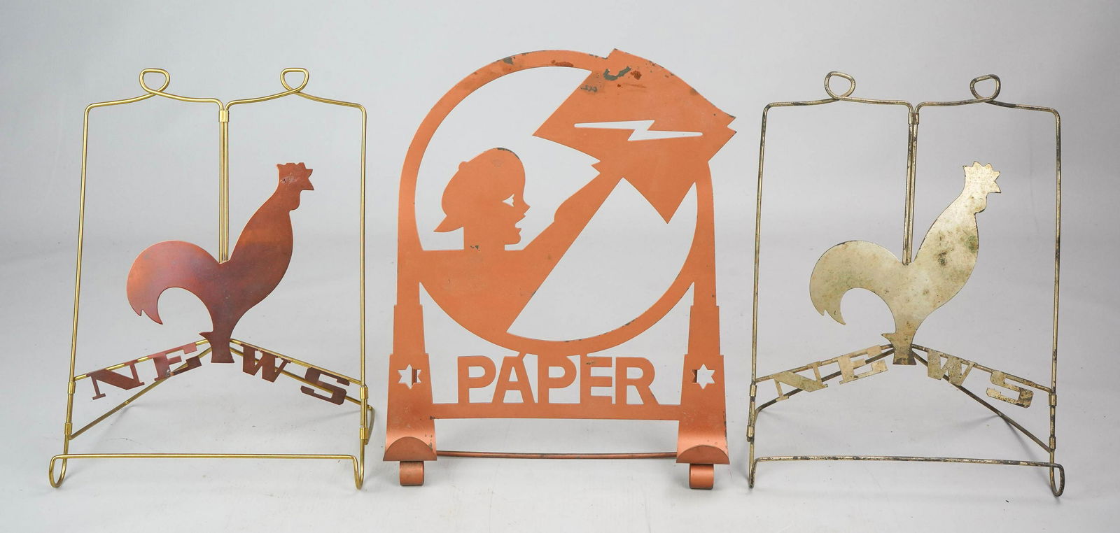 (3) Brass & Copper Newspaper Holders: (3) Brass & copper newspaper holders, c/o (2) Chase "NEWS" with rooster designed by Lurelle Guild, "PAPER" newsboy (unmarked), some finish wear, 11-1/2" h