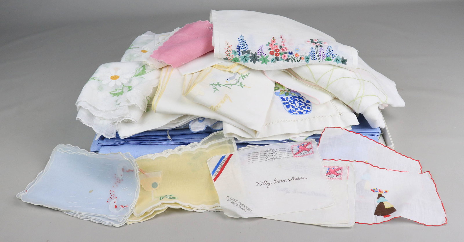 (50)+ Embroidered Place Settings: (50)+ Embroidered place settings featuring frogs, flowers, insects, scrolling designs and more. Grouping also includes (5) embroidered cocktail napkin sets and blue linen table set.