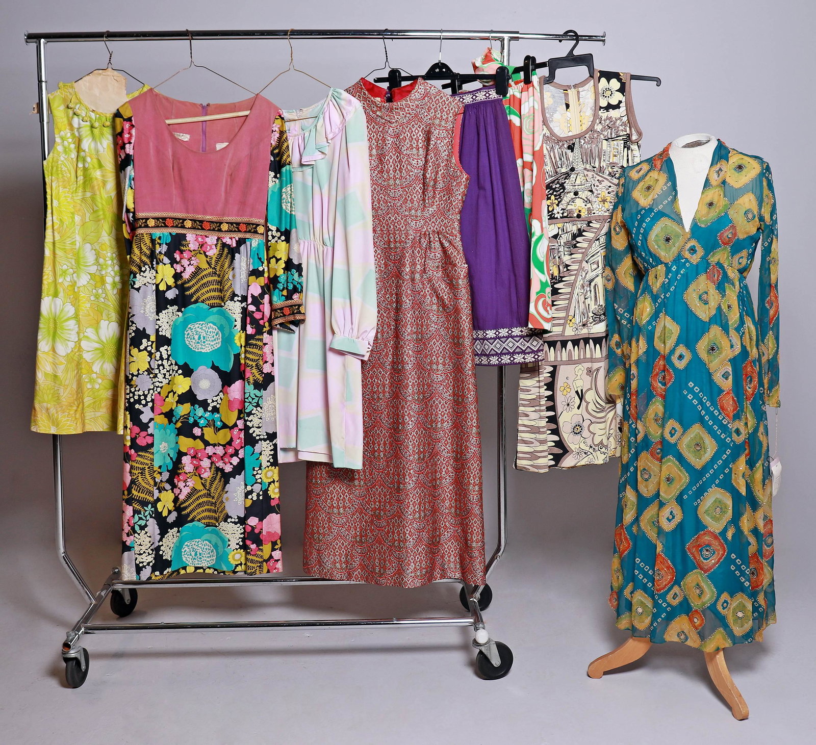 (8) Pc 1960's/70's Garment Group: (8) Pc 1960's/70's garment group including Elinor Simmons for Malcolm Starr deadstock chiffon dress, 2/4, some small holes (2) 1970's skirts, Dynasty pillar dress, floral full length dress with micro 