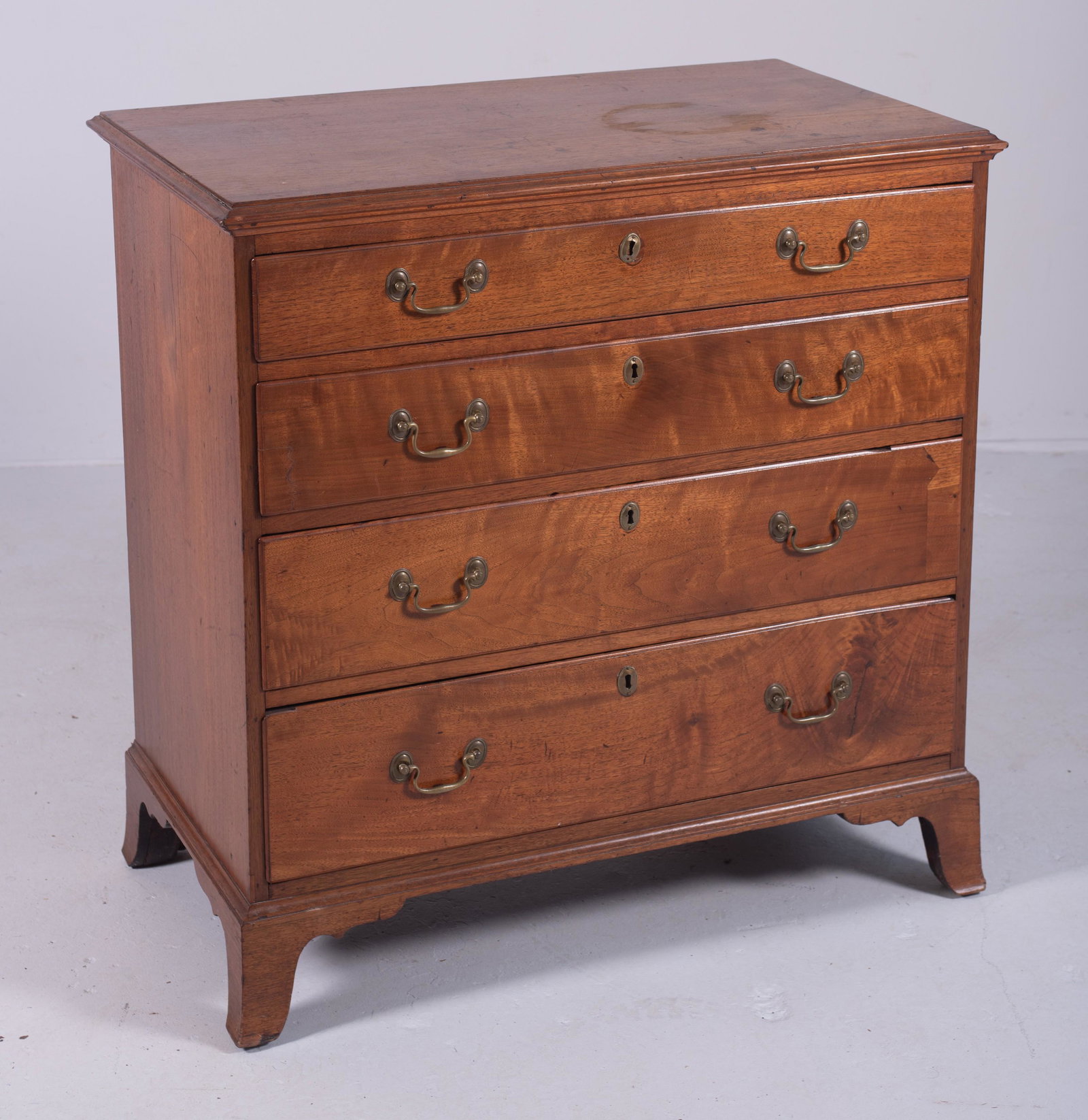 Walnut Hepplewhite 4 Drawer Bureau: Walnut Hepplewhite 4 Drawer Bureau, 4 lipped graduated drawers with original bail brasses, original flared French feet, 36" w, 37 1/2" h, PA, late 18th c