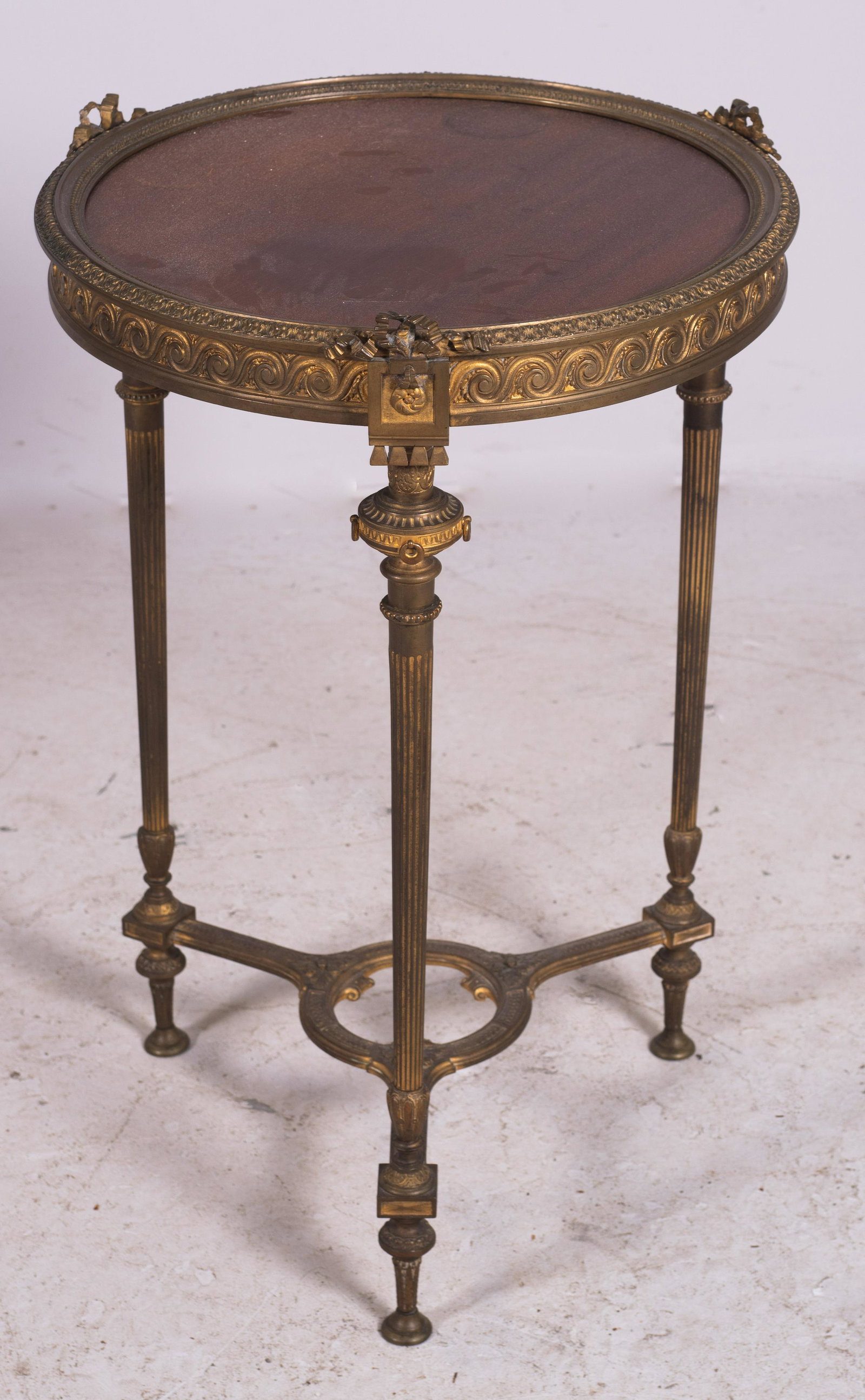 Louis XVI style bronze gueridon , 19th c: Louis XVI style bronze gueridon with round mahogany top, 19 1/2" d, 29" h, 19th c