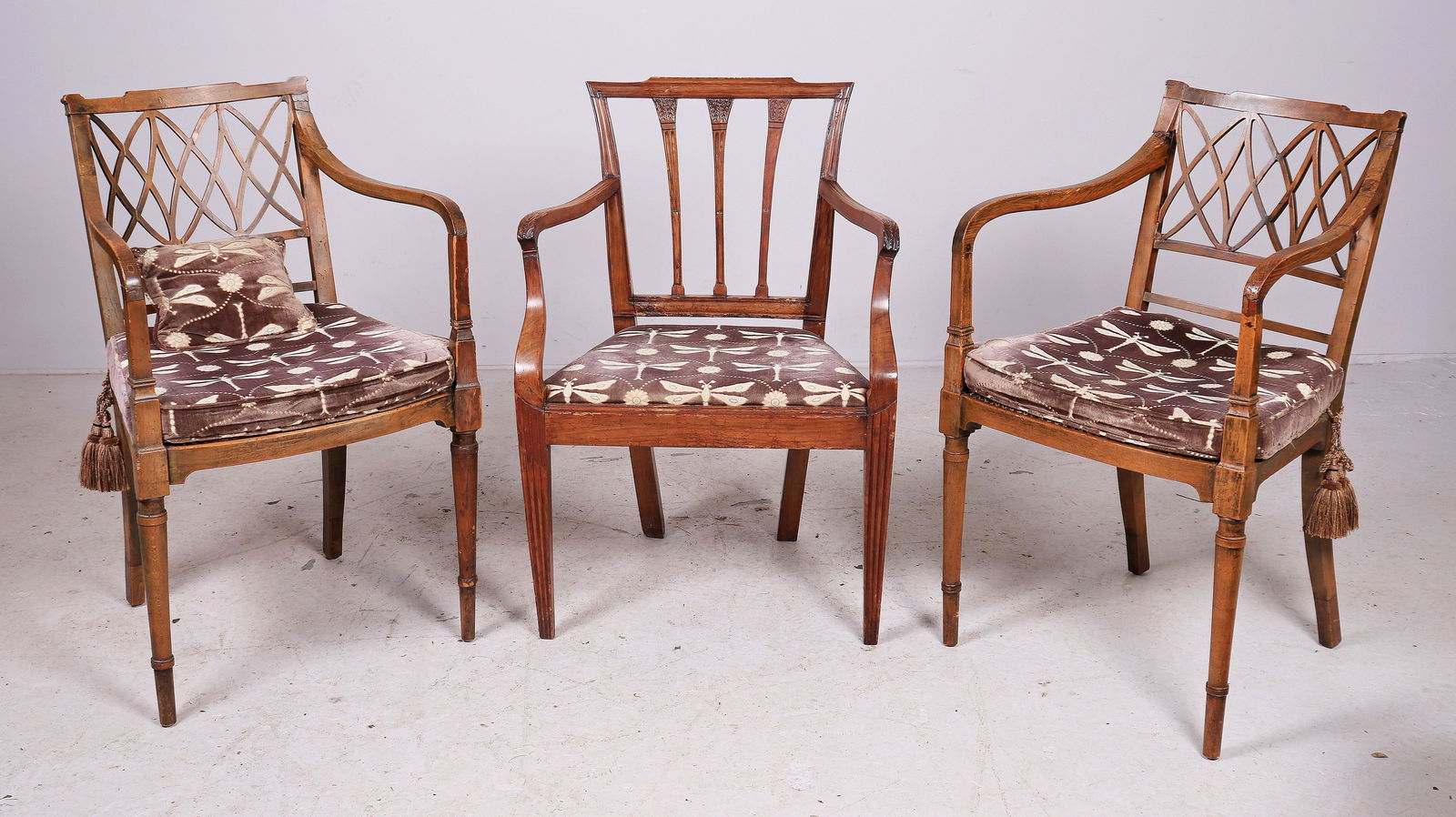 (3) Regency Mahogany Armchairs, 19 c: Pr Regency Mahogany Armchairs, Latticework Backs, caned seats; with a Sheraton mahogany armchair with spindle back and reeded tapered legs, all early 19 c, all with repairs and roughness