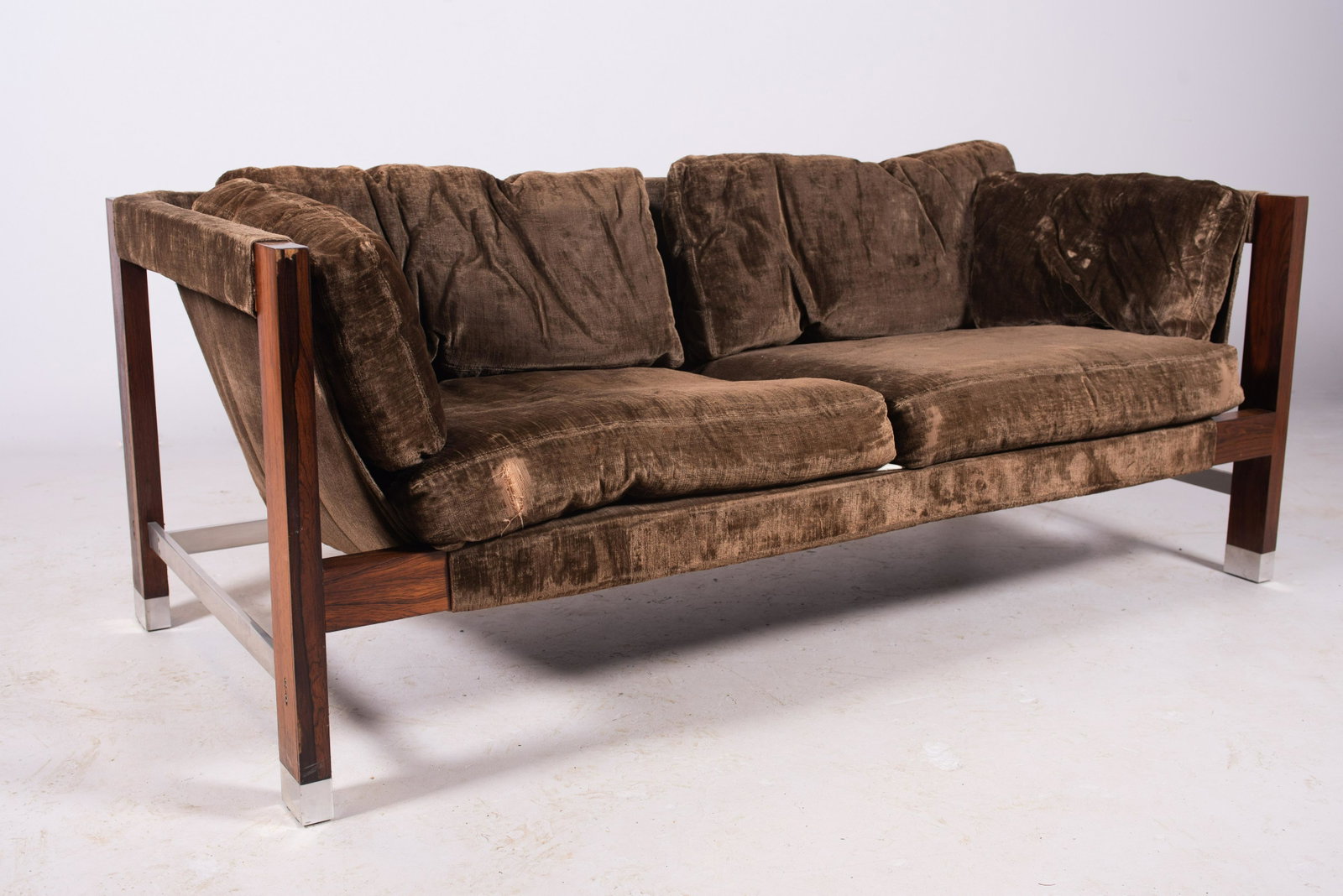 Milo Baughman for Founders sling loveseat: Milo Baughman for Founders Modern rosewood and chrome sling loveseat, brown velvet upholstery, 26"h x 68-1/4"w, some veneer damage