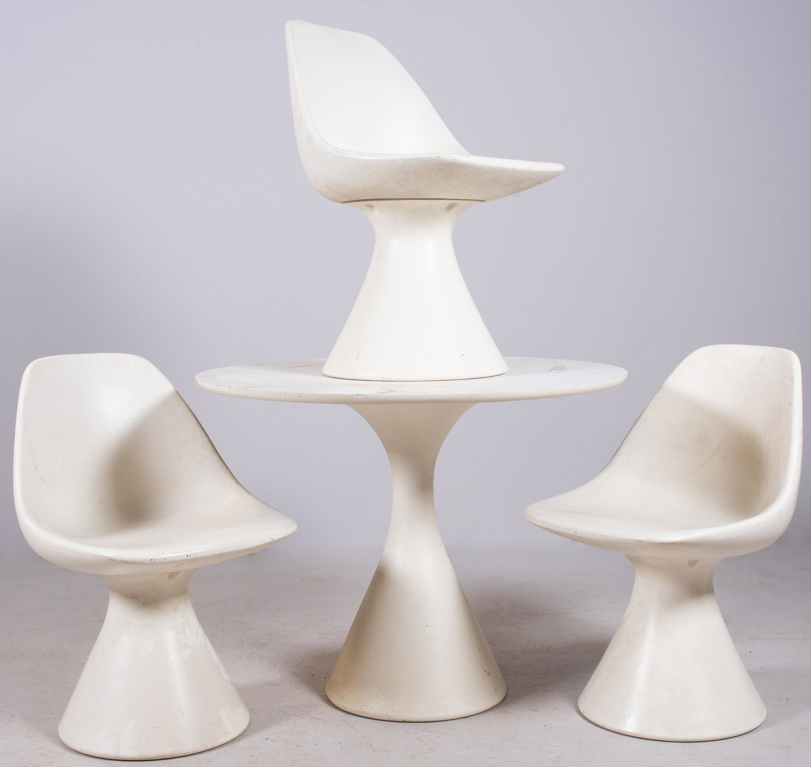 (4) pc Maurice P. Burke for Arkana "Mushroom" DRS: (4) pc Maurice P. Burke for Arkana Modern "Mushroom" DRS, c/o 3 plastic swivel chairs, dining table, table 28"h x 38"diameter